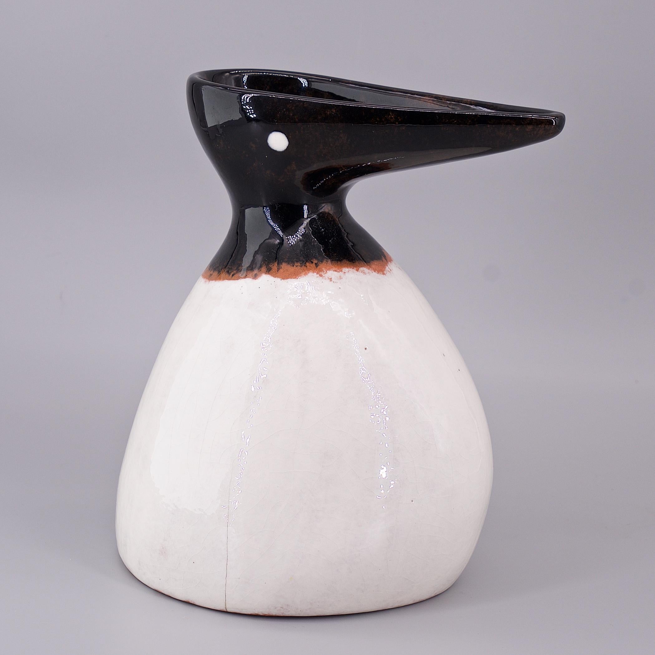 Early Edmund Ronaky for Jaru of Callfornia Sea Bird Pitcher/Vessel. Iconic Midcentury Southern California design. 
W 6 x D 5.25 x H 7.25 in.

This vessel has manufacturing defects; firing cracks to white bottom edge and to the bottom, and a glaze