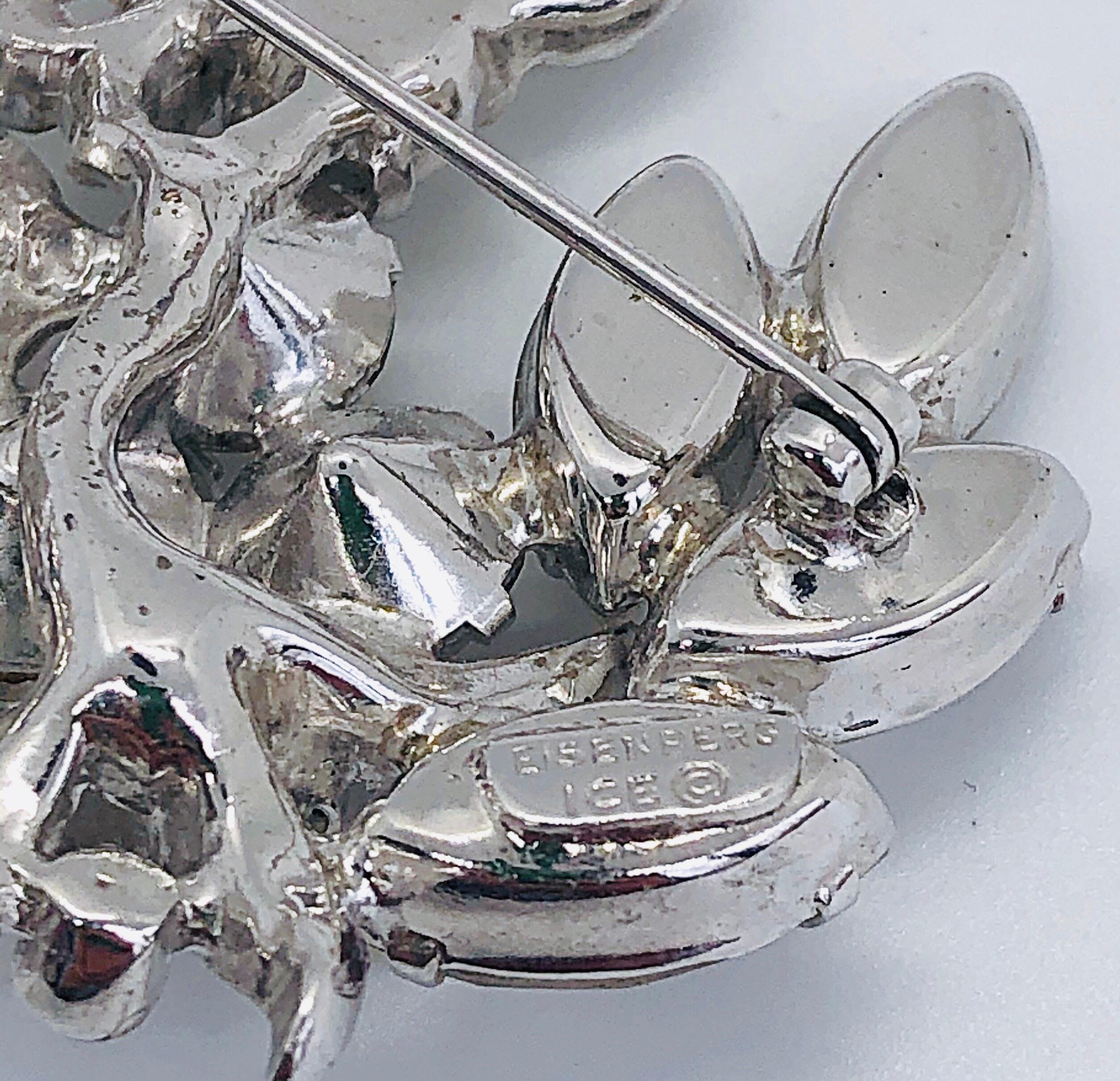 Beautiful 1950s EISENBERG ICE Swarovski crystal rhinestone large signed brooch pin ! Features large shiny rhinestones and crystals throughout. The perfect accessory for any outfit. Can really take an outfit to the next level !
Measurements: 
1.75