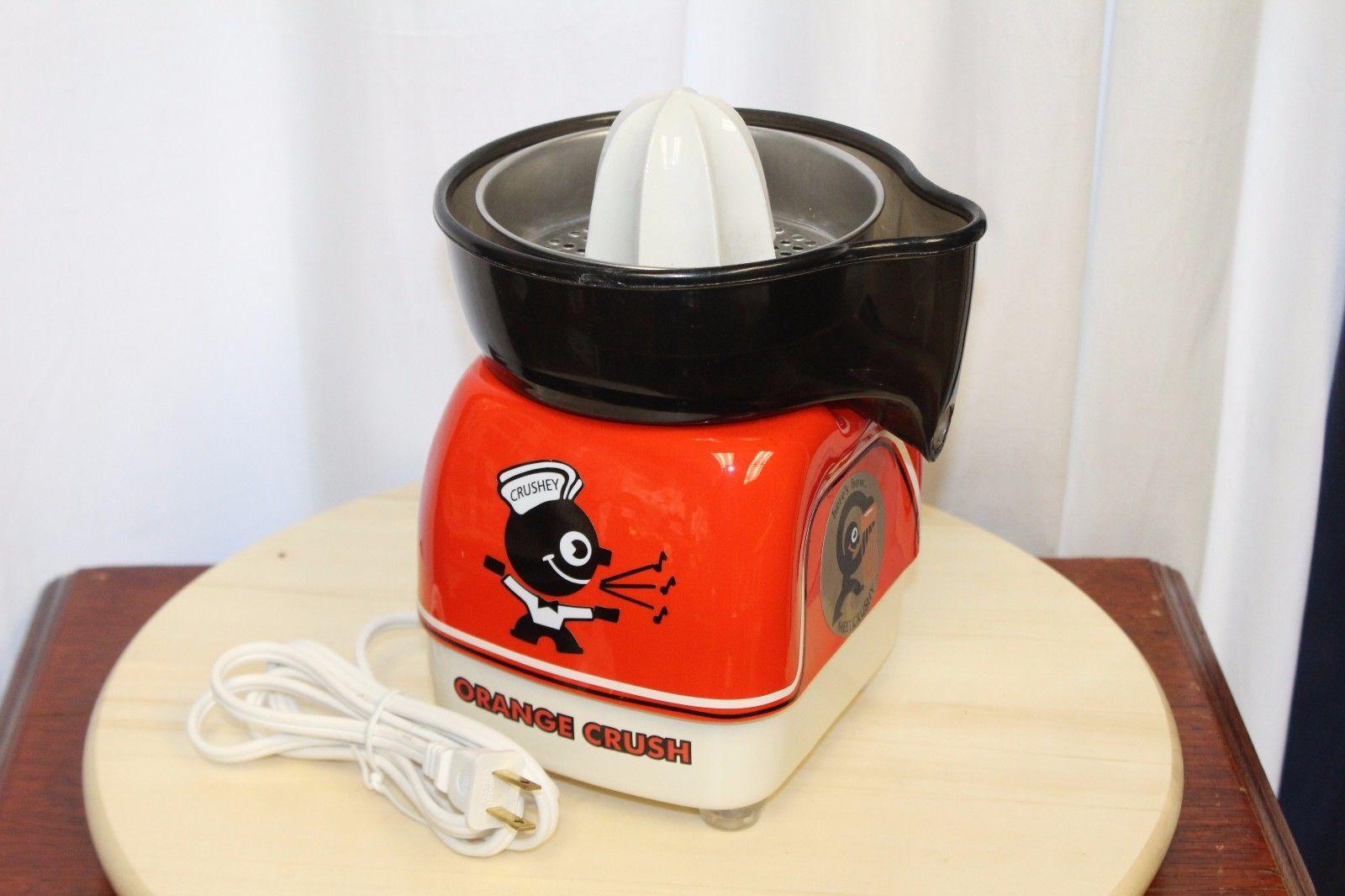 This restored juicer has orange crush themed decals. Working condition. This was made by Juicit Corp.