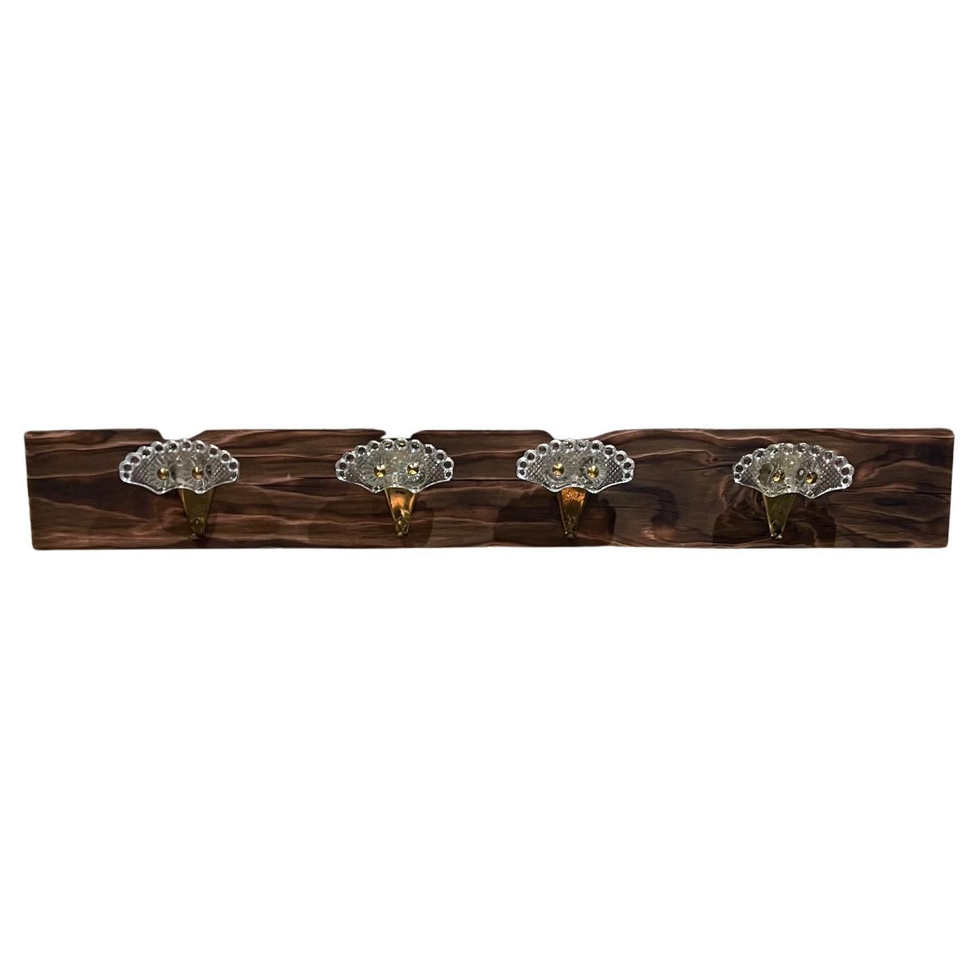 Elegant Italian art glass and brass coat hat rack hooks set of four
Style of Fontana Arte, unmarked.
With wood 5.25 x 40 W x 3.5 D
Each hook is 2 D x 5 W x 4.25 tall
Preowned original vintage condition.
Selling Hooks only. Wood is for