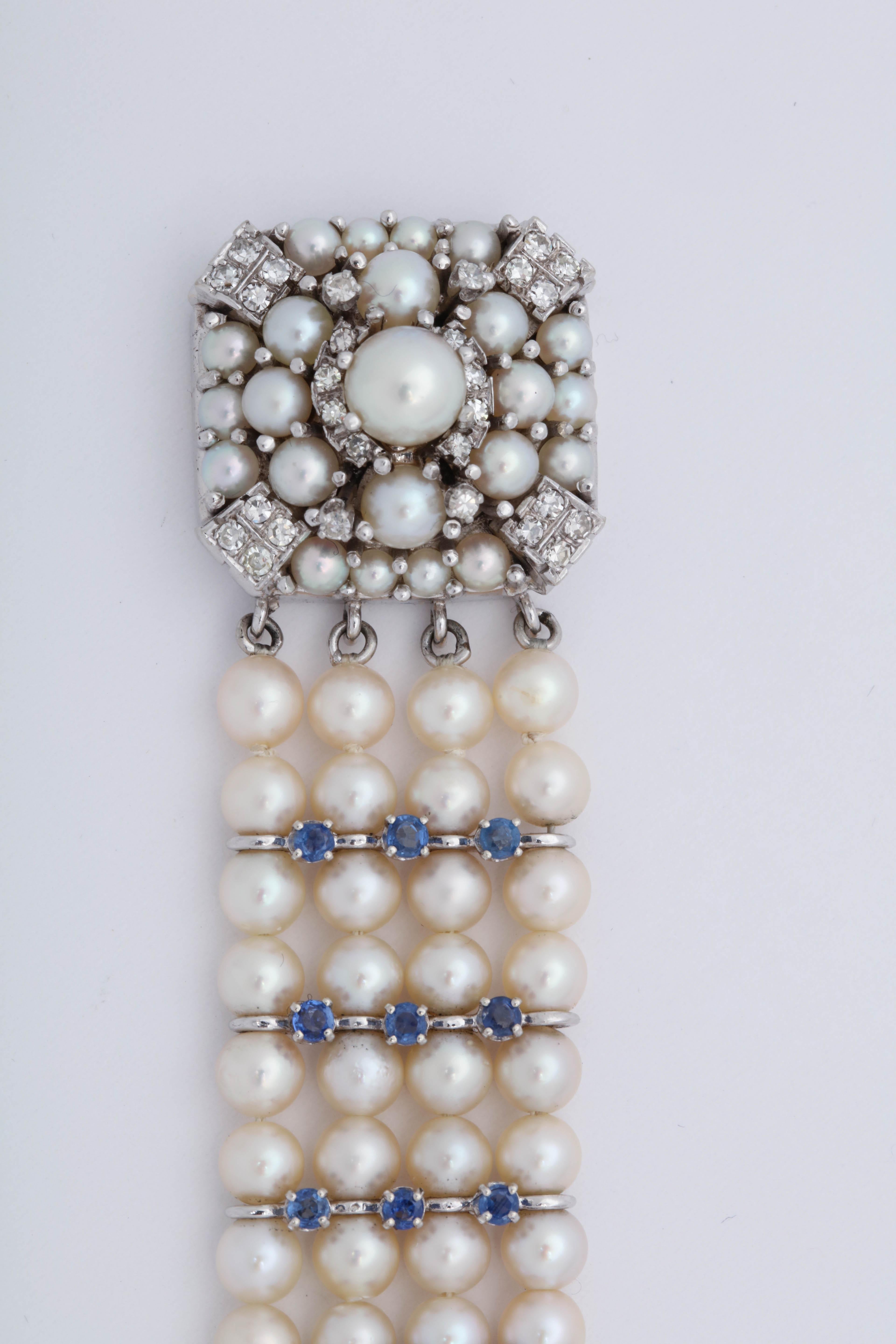 1950s Elegant Pearl with Sapphires and Diamonds Flexible White Gold Bracelet In Good Condition In New York, NY