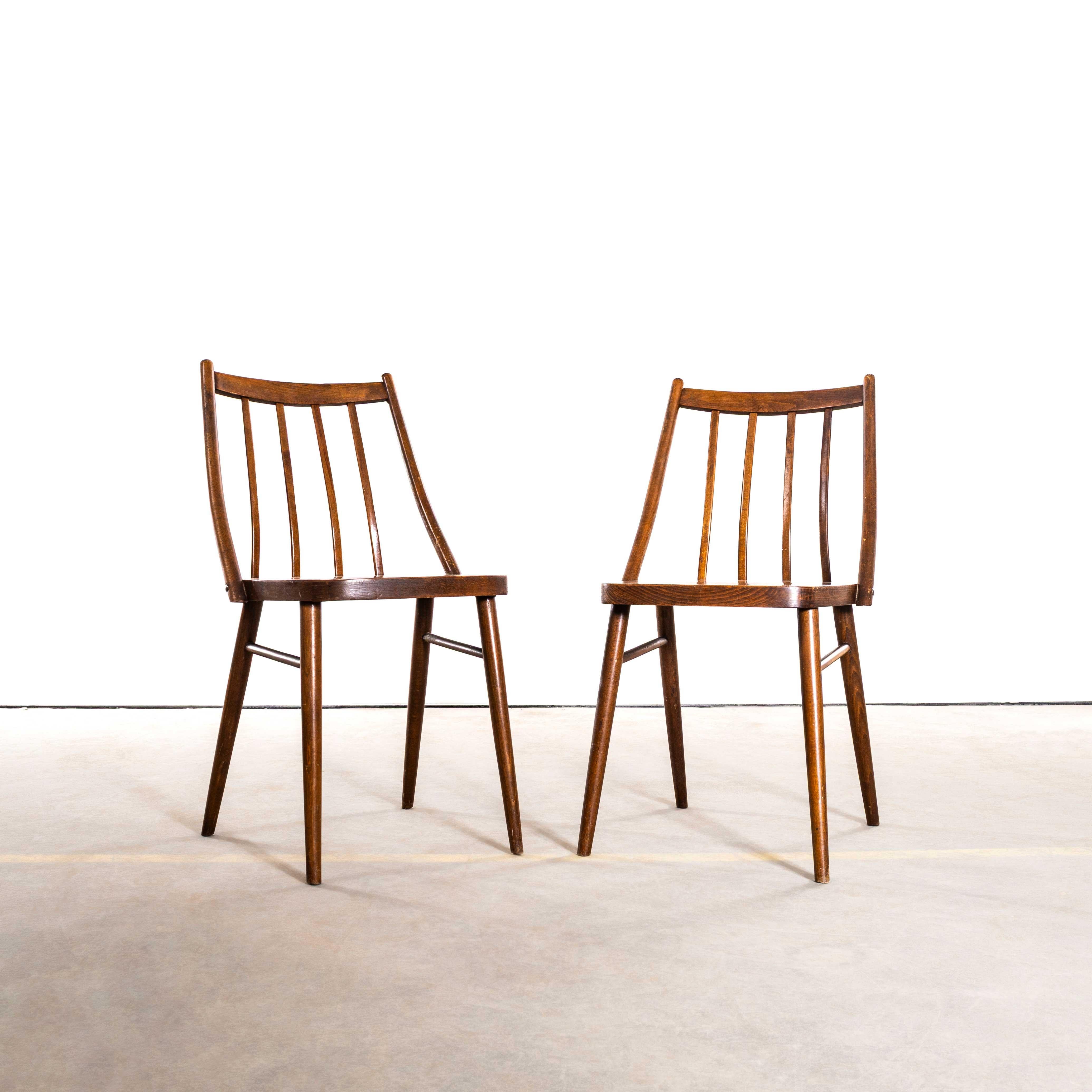 1950’s Elegant Scoop Back Bentwood Dining Chairs – Pair. Beautiful simple bentwood chairs sourced in the Czech Republic and made by Tatra Nabytok. The chairs are made in steam bent beech by one of the original Czechoslovakia producers of bentwood.
