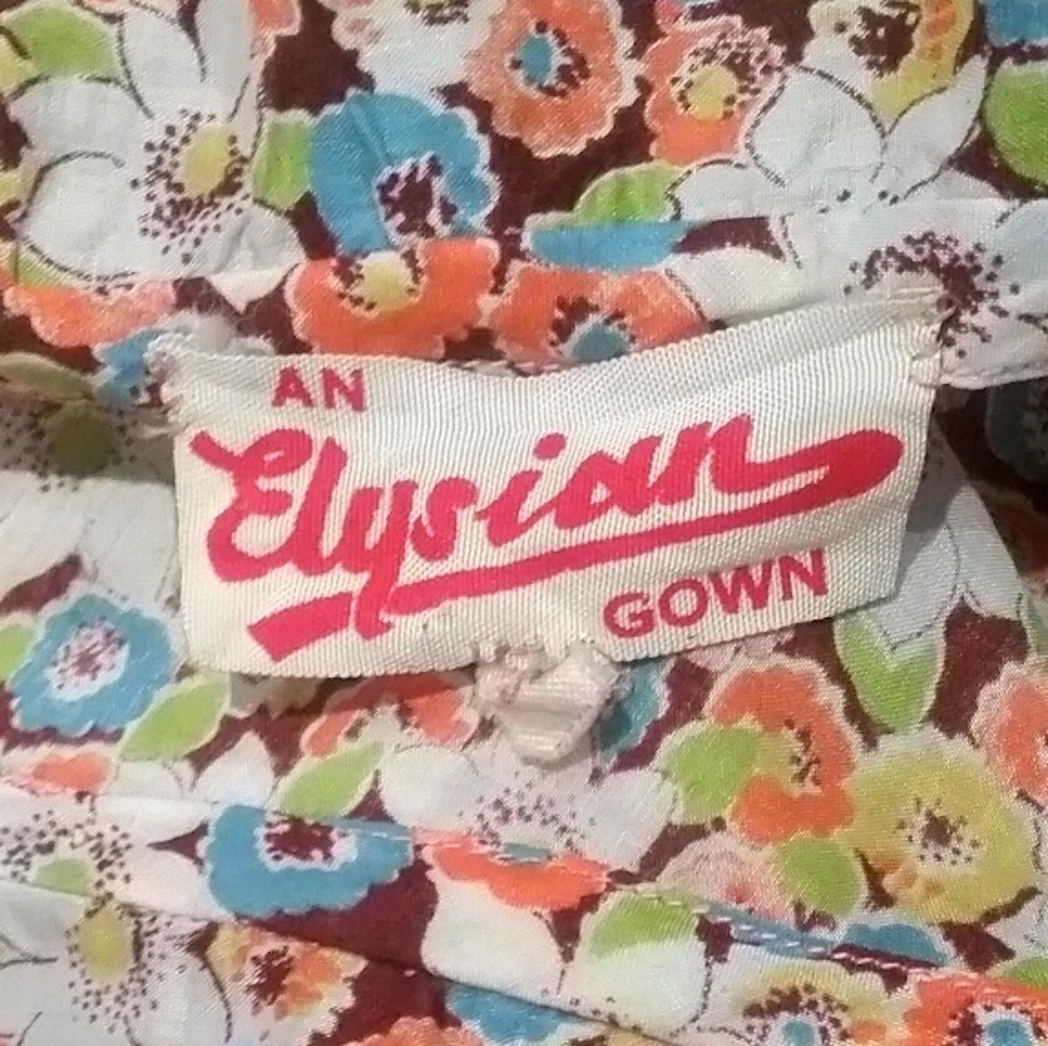 1950s Elysian Floral Cotton Dress With Asymmetrical Neckline and Peplum 1