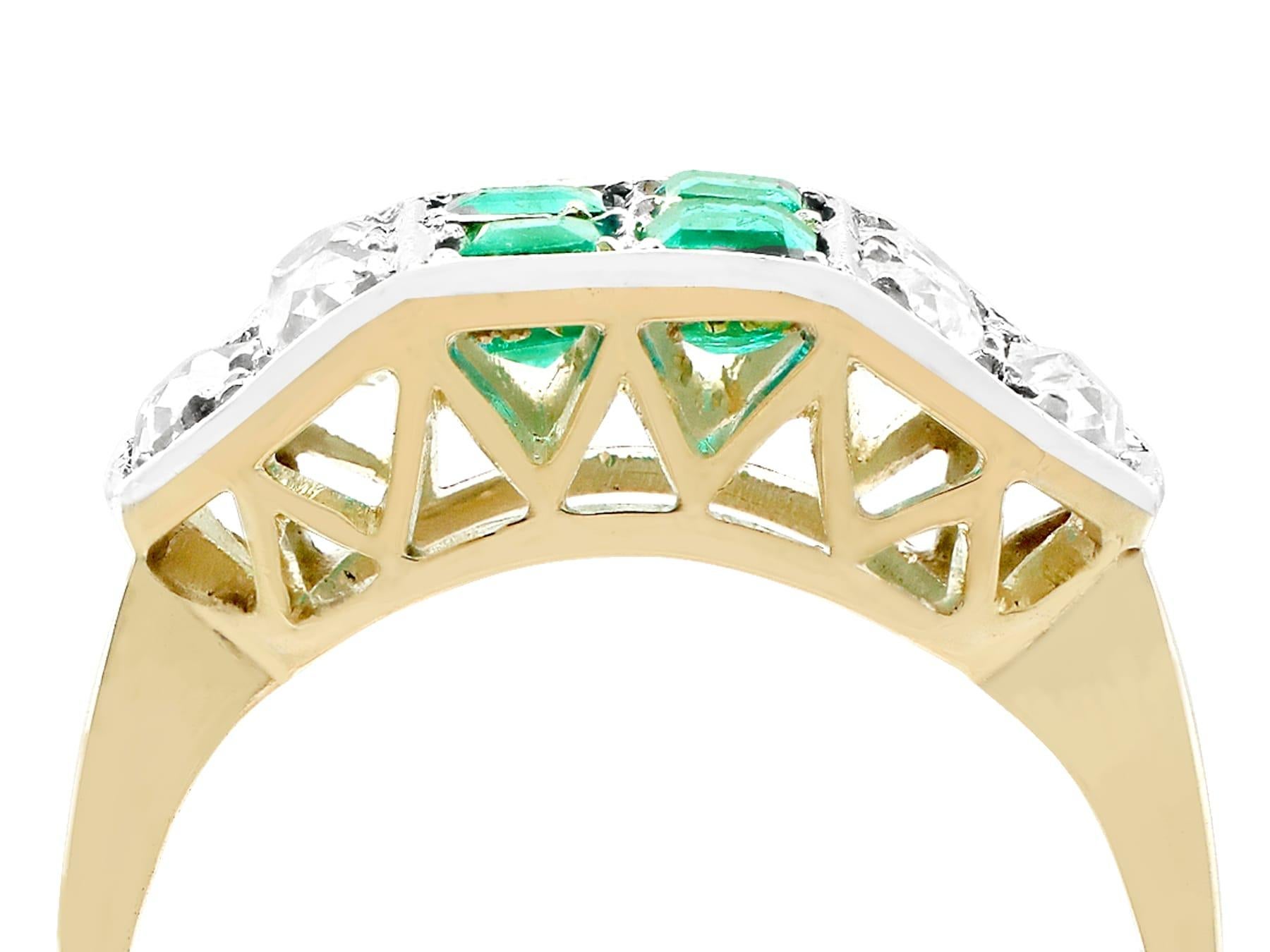 A stunning vintage 1950s 0.88 carat emerald and 1.10 carat diamond, 14 karat yellow and white gold cocktail ring; part of our diverse vintage jewelry and estate jewelry collections.

This fine and impressive vintage emerald and diamond band ring has