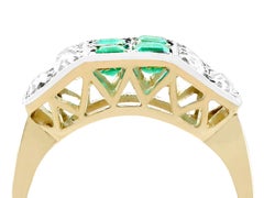 1950s Emerald and 1.10 Carat Diamond Yellow Gold Cocktail Ring