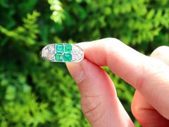 1950s Emerald and 1.10 Carat Diamond Yellow Gold Cocktail Ring