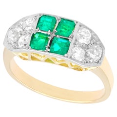 1950s Emerald and 1.10 Carat Diamond Yellow Gold Cocktail Ring