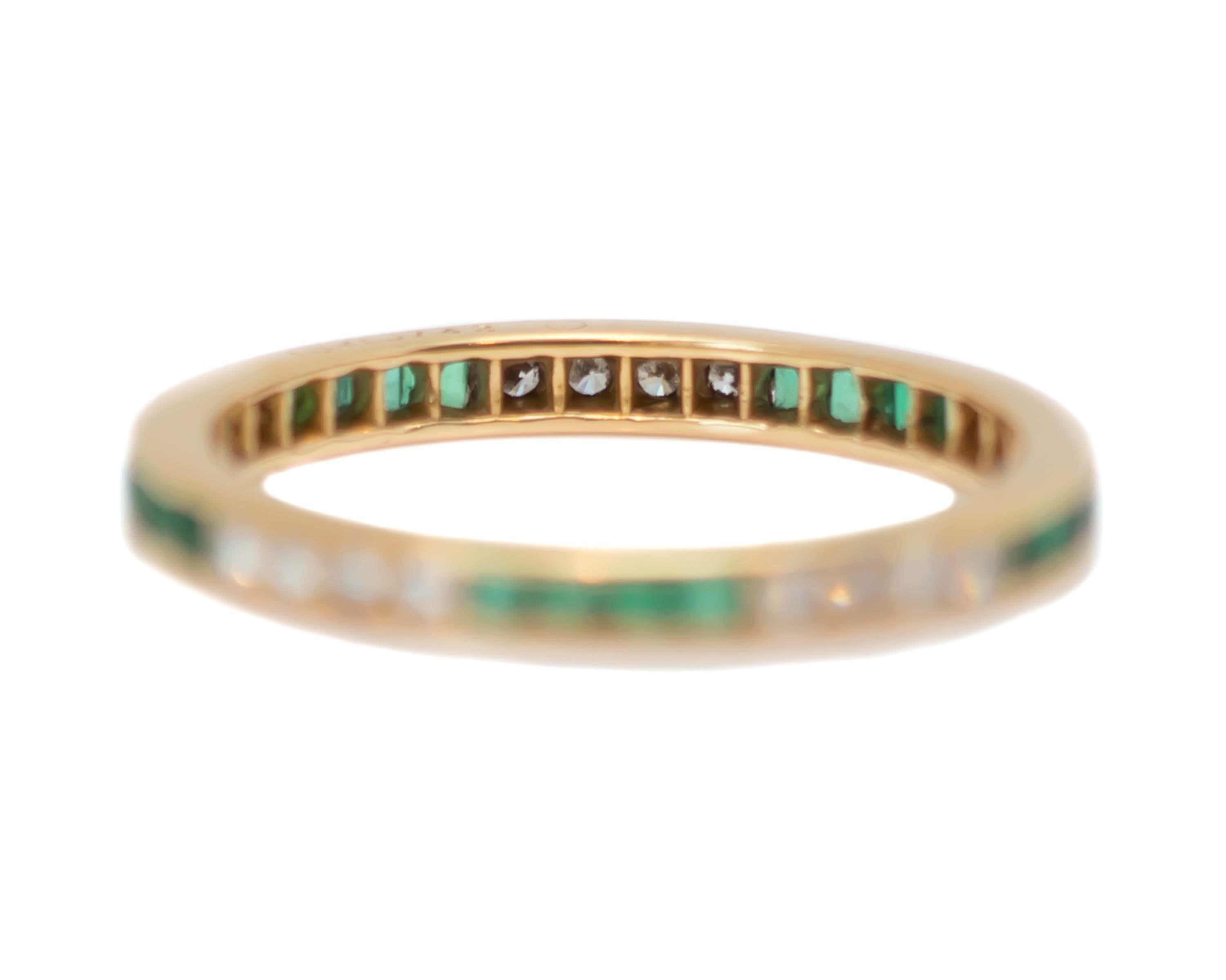 emerald eternity band yellow gold