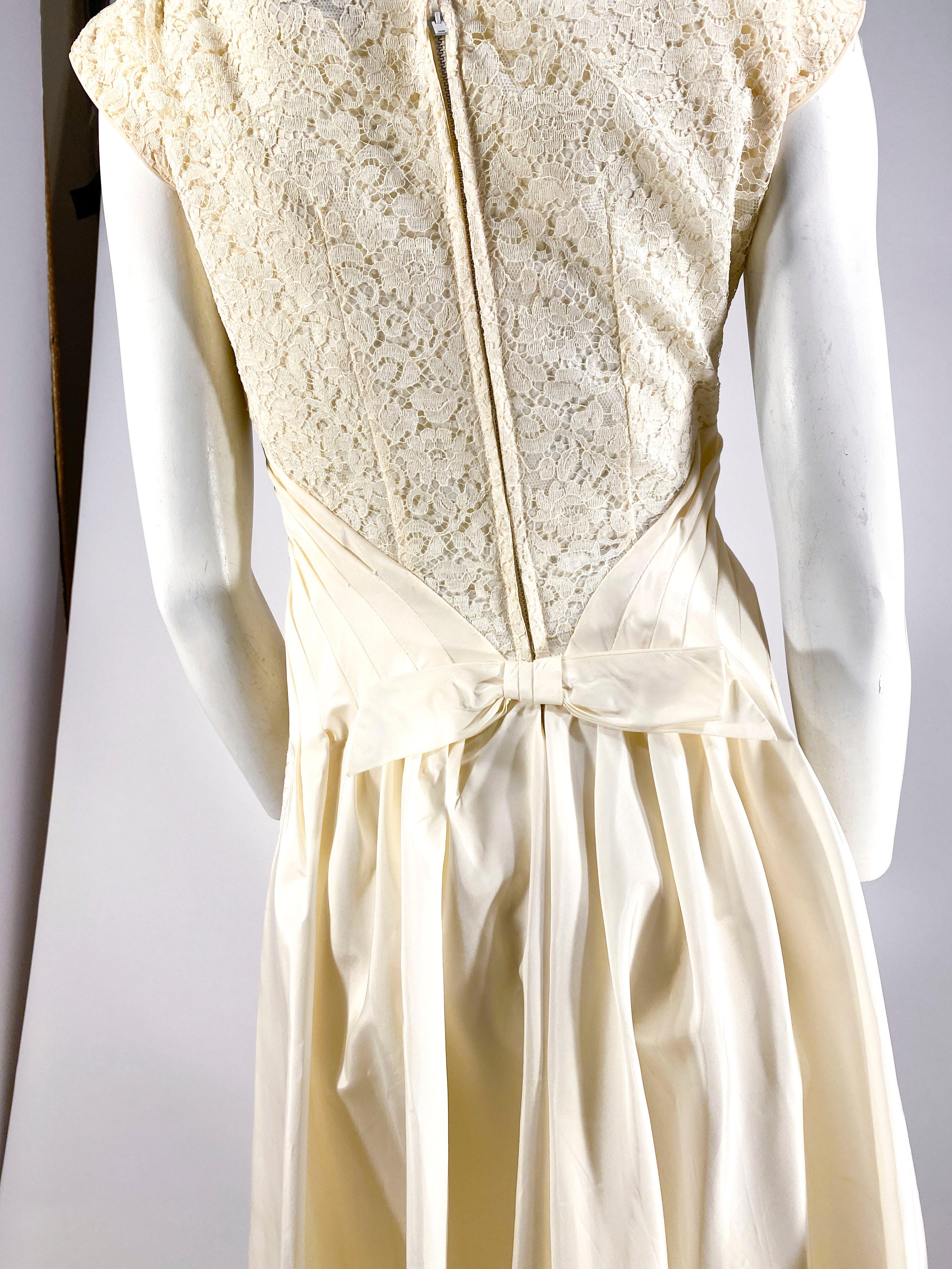 Women's 1950s Emma Domb Off-white Lace Dress with Taffeta Waist and Draped back For Sale