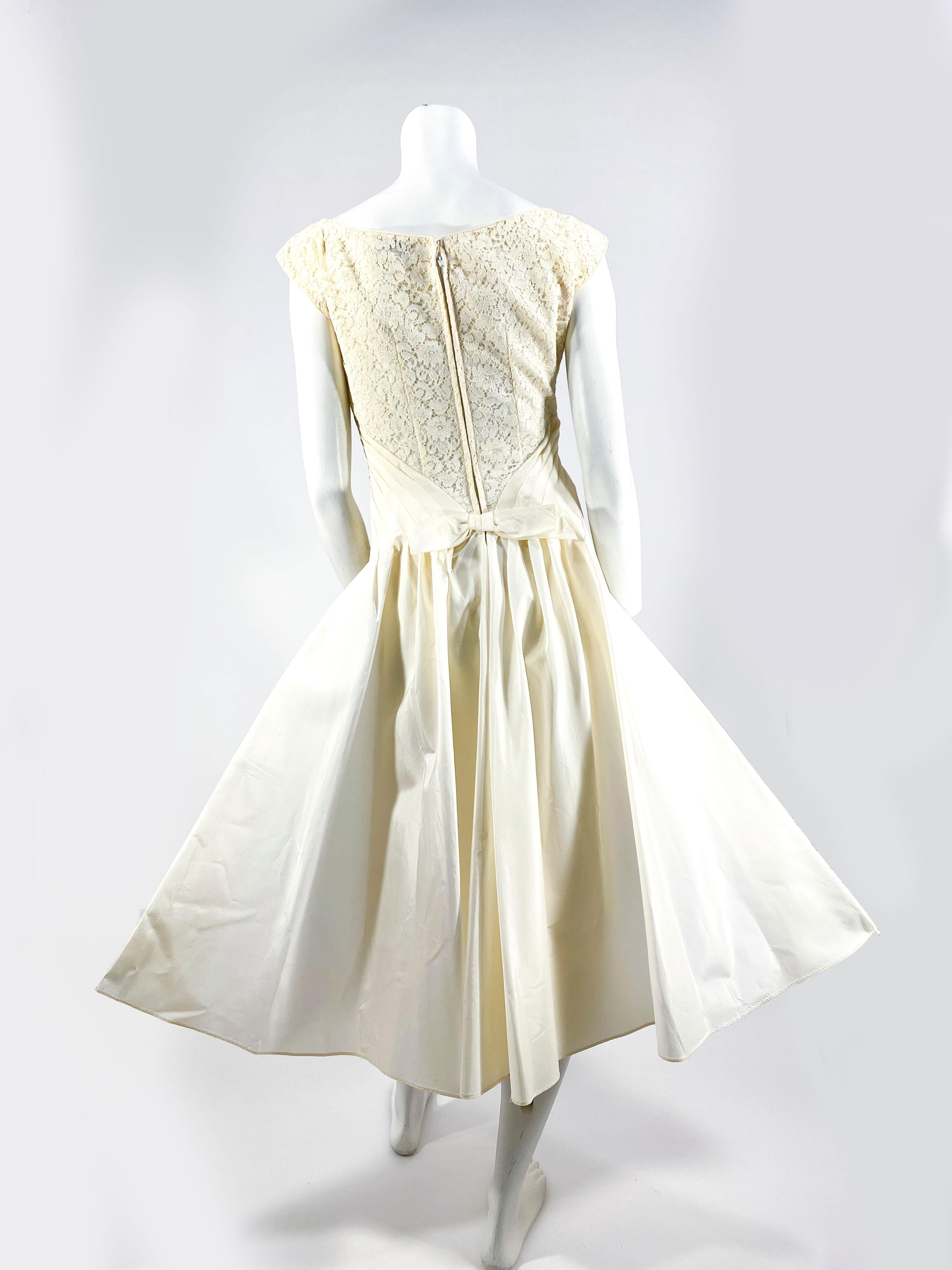 1950s Emma Domb Off-white Lace Dress with Taffeta Waist and Draped back For Sale 1