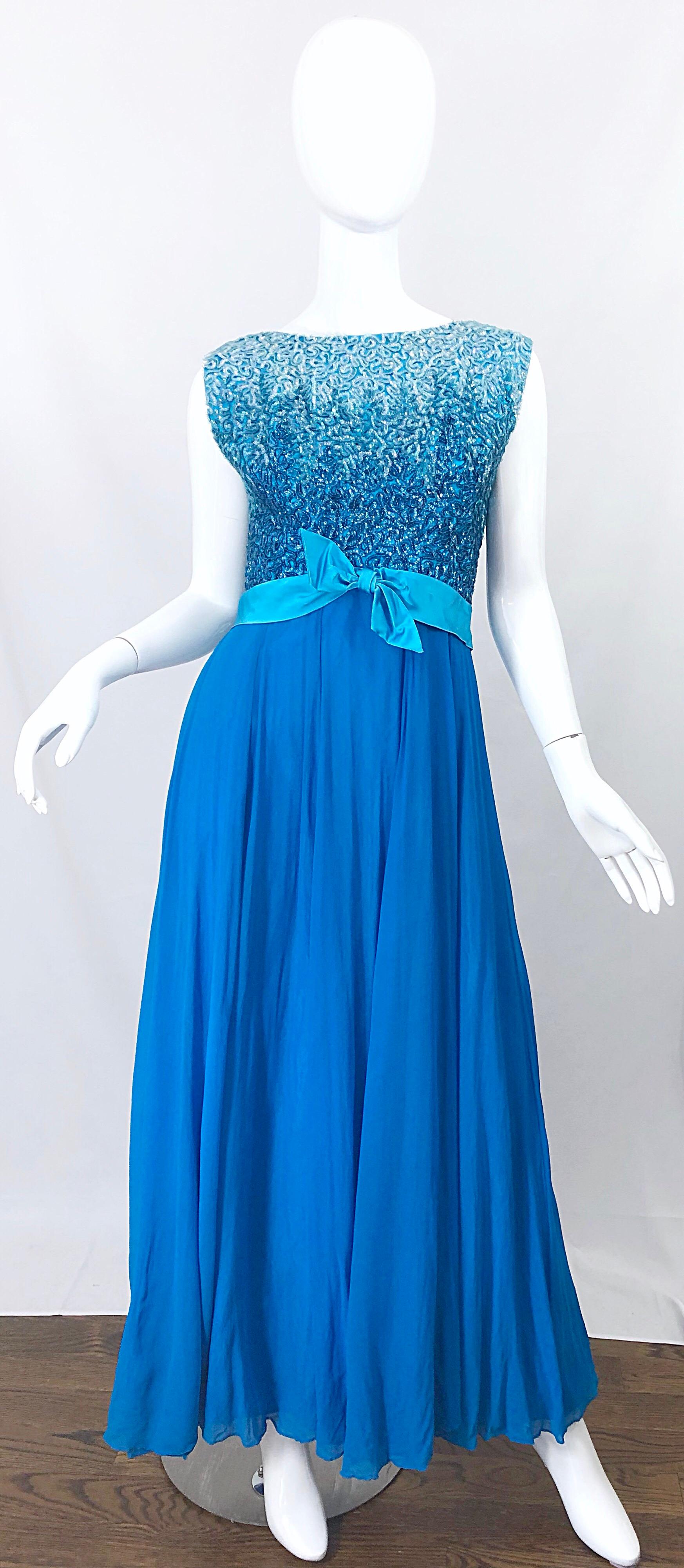Stunning early 1960s EMMA DOMB turquoise blue silk chiffon ombre sequined evening gown! Bodice features thousands of 
hand-sewn sequins throughout the front and back. Full metal zipper up the back with hook-and-eye closure. Luxurious silk chiffon
