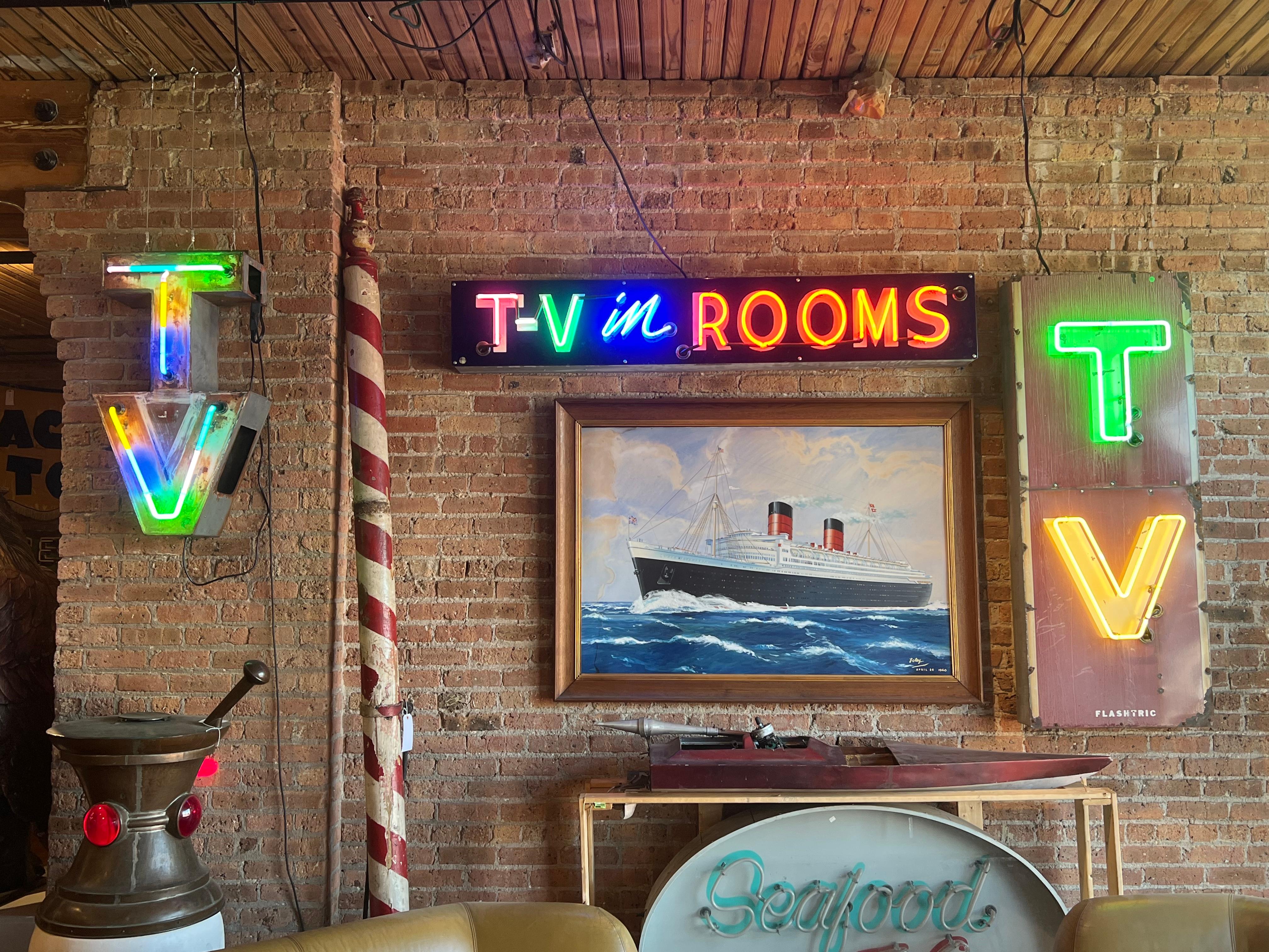 1950’s enamel and glass TV sign. It has new transformer and new wiring. There will be Additional fee for shipping crate.