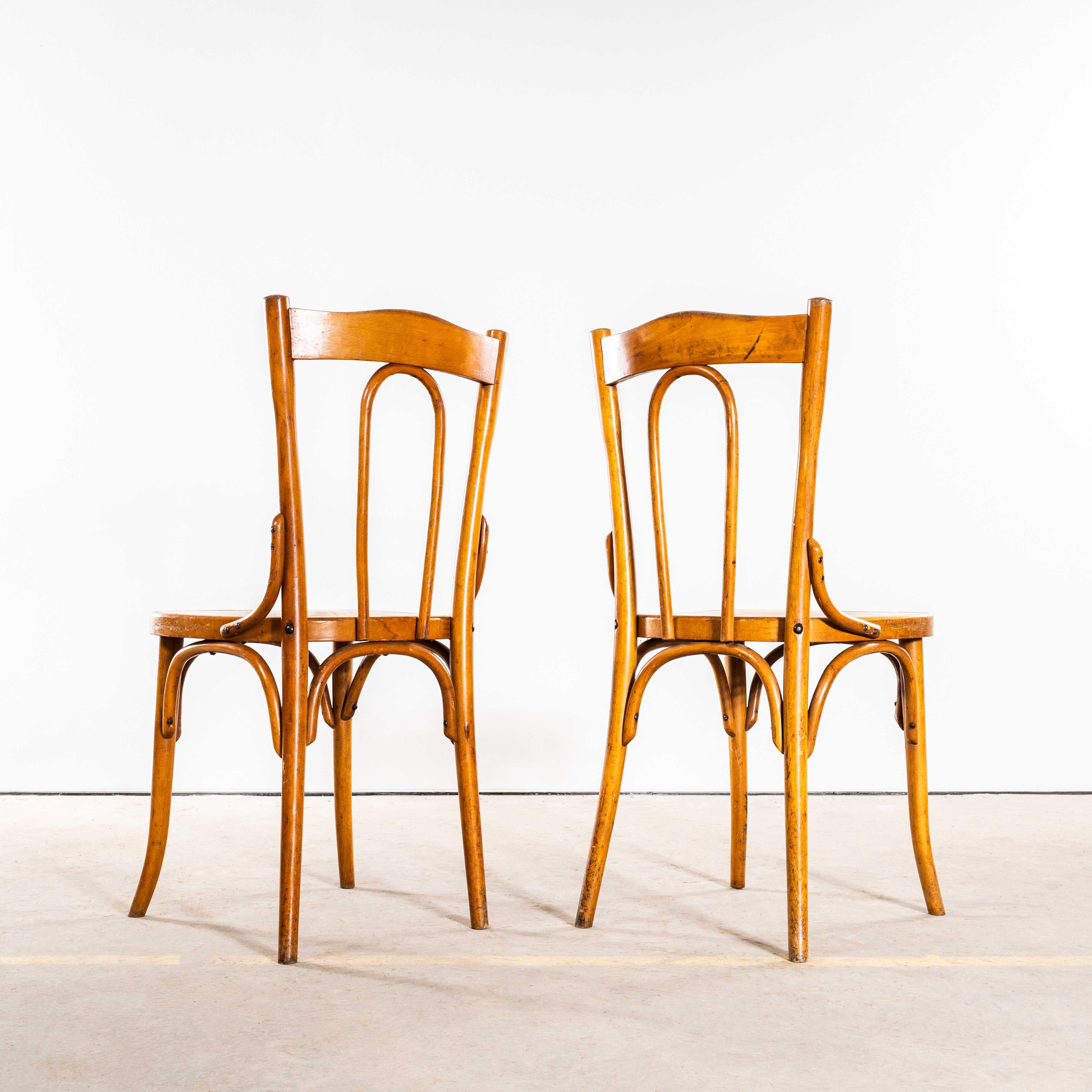 Legno curvato Sedie da pranzo in bengala con schienale a cerchio chiuso degli anni '50 - Coppia in vendita