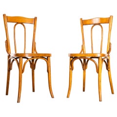 Chaises de salle à manger en bentwood à dossier arrondi des années 1950 - Paire