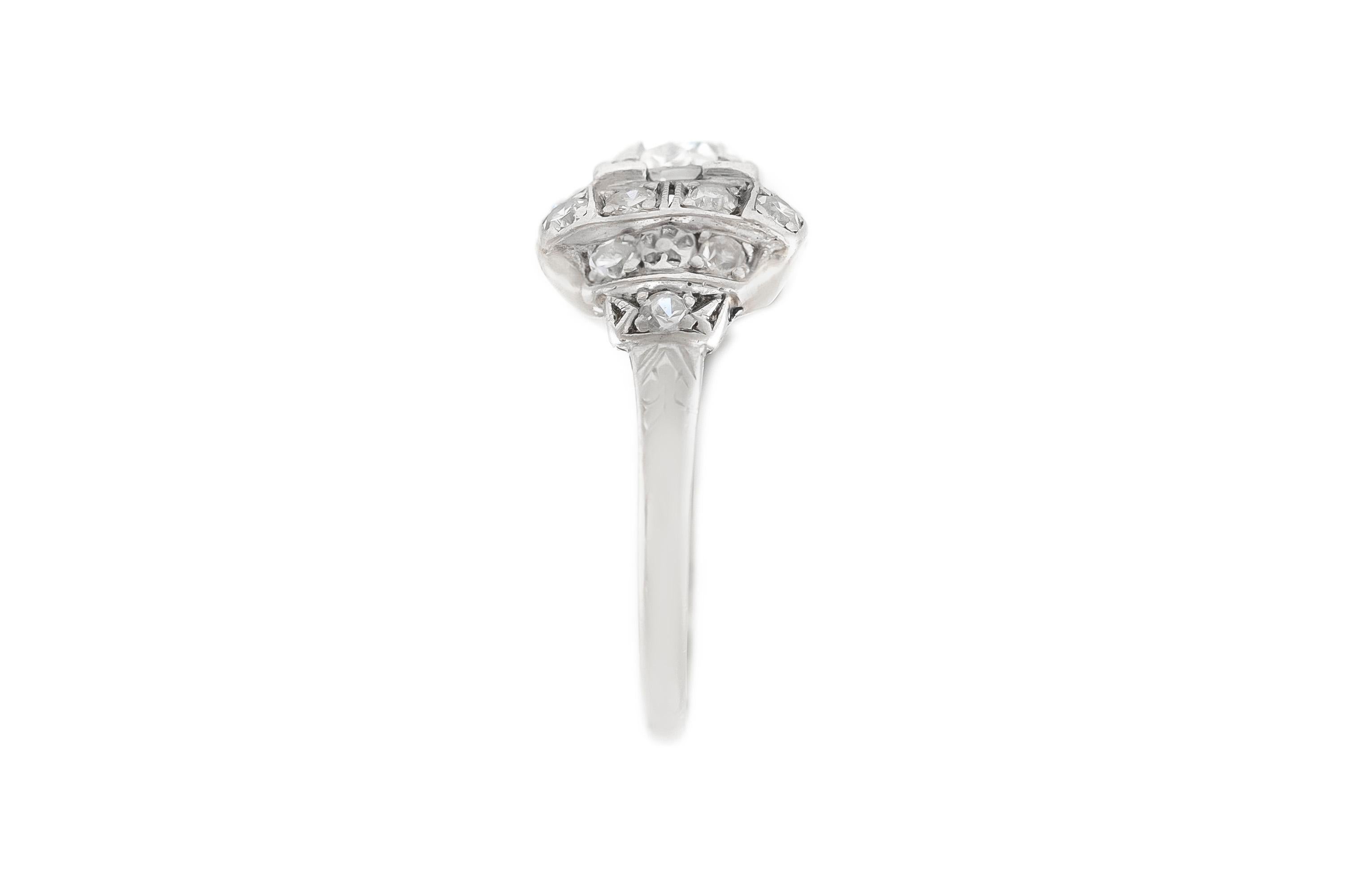 The beautiful ring i finely crafted in platinum with center dia 0.70 carat and around diamonds weighing approximately total of 0.50 carat.
Circa 1950.
Easy to resize