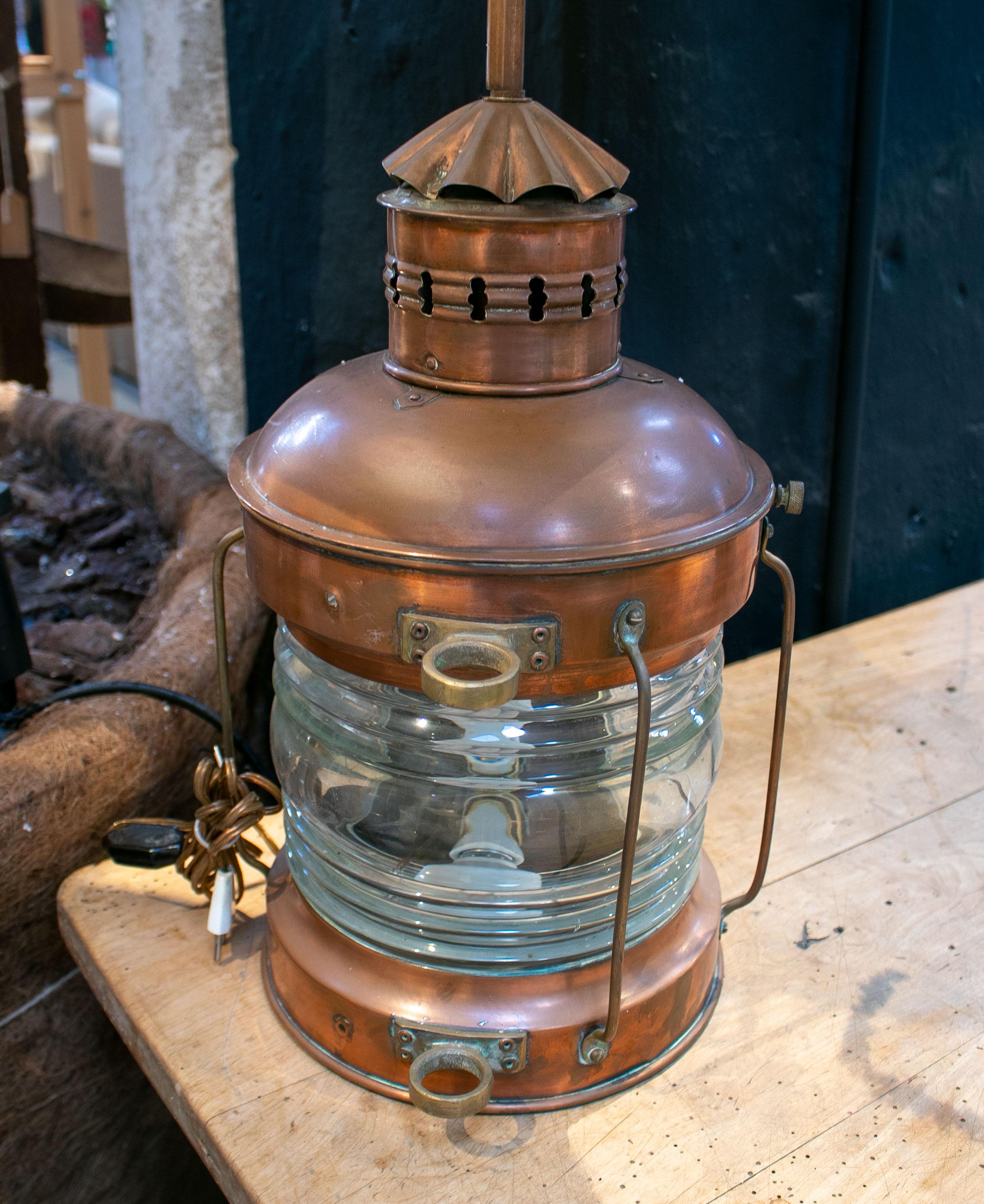 1950s English bronze and glass ship table lamp with shade.