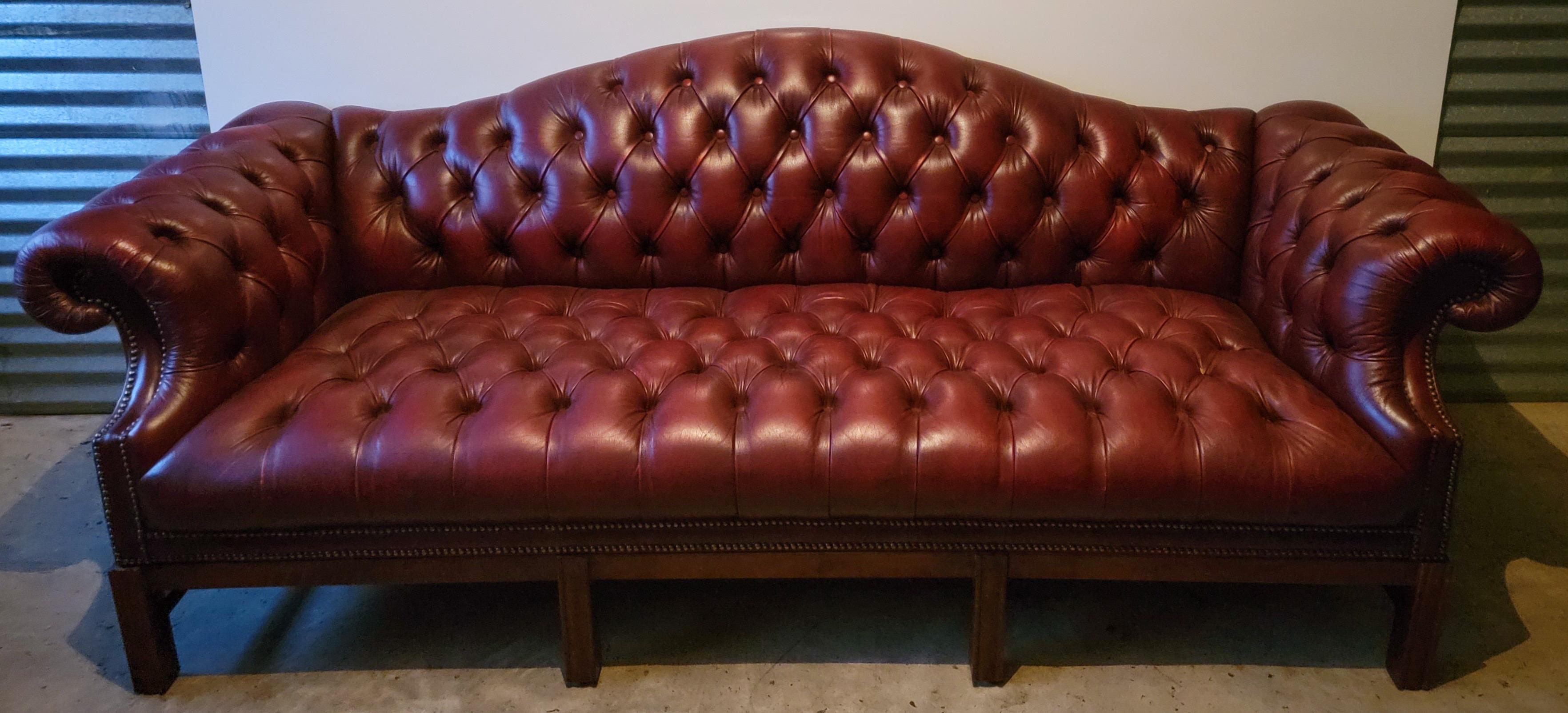 Mid-20th Century 1950s English Burgundy Tufted Leather Chesterfield Camelback Sofa