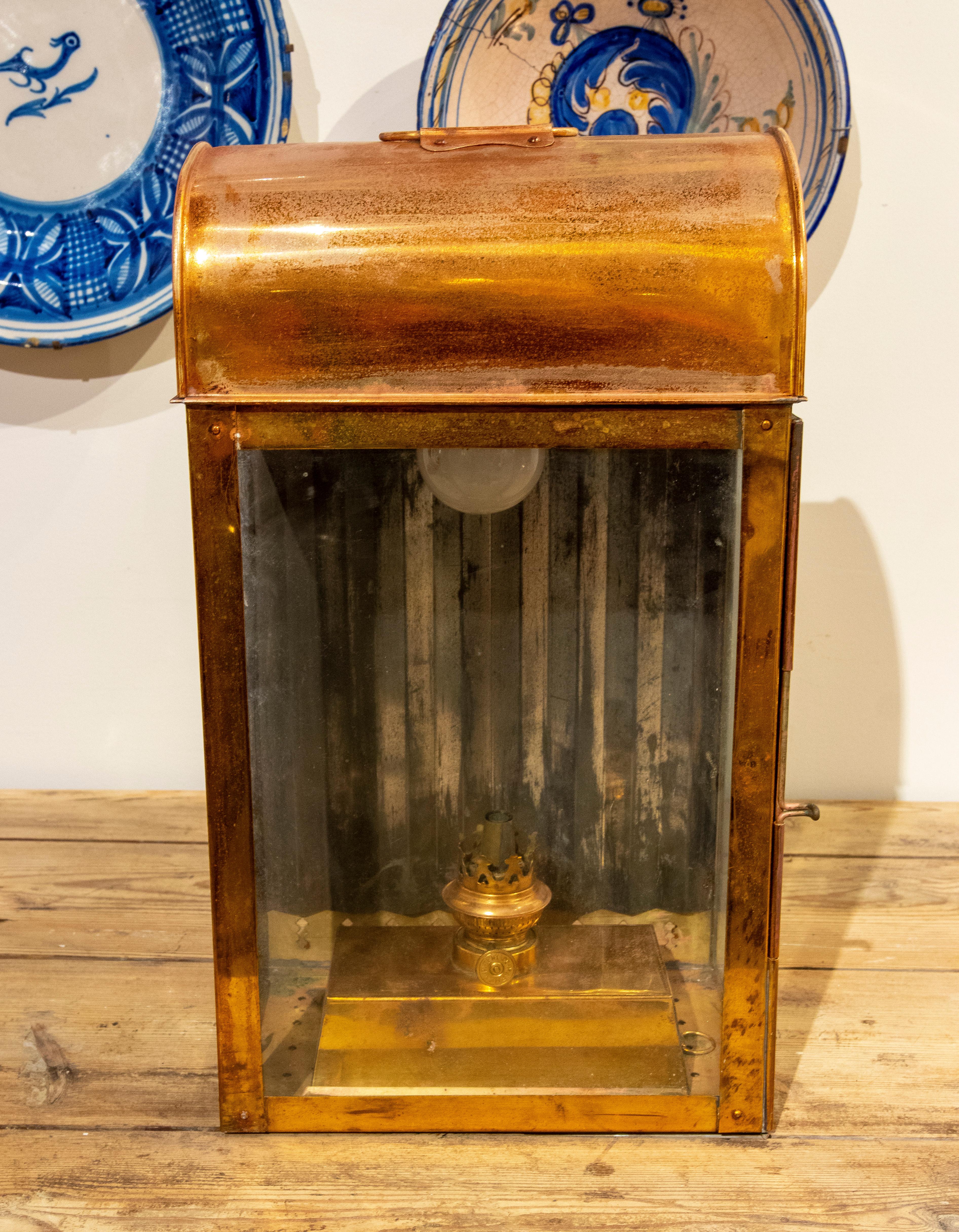 1950s English copper oil lantern with glass and mirror.