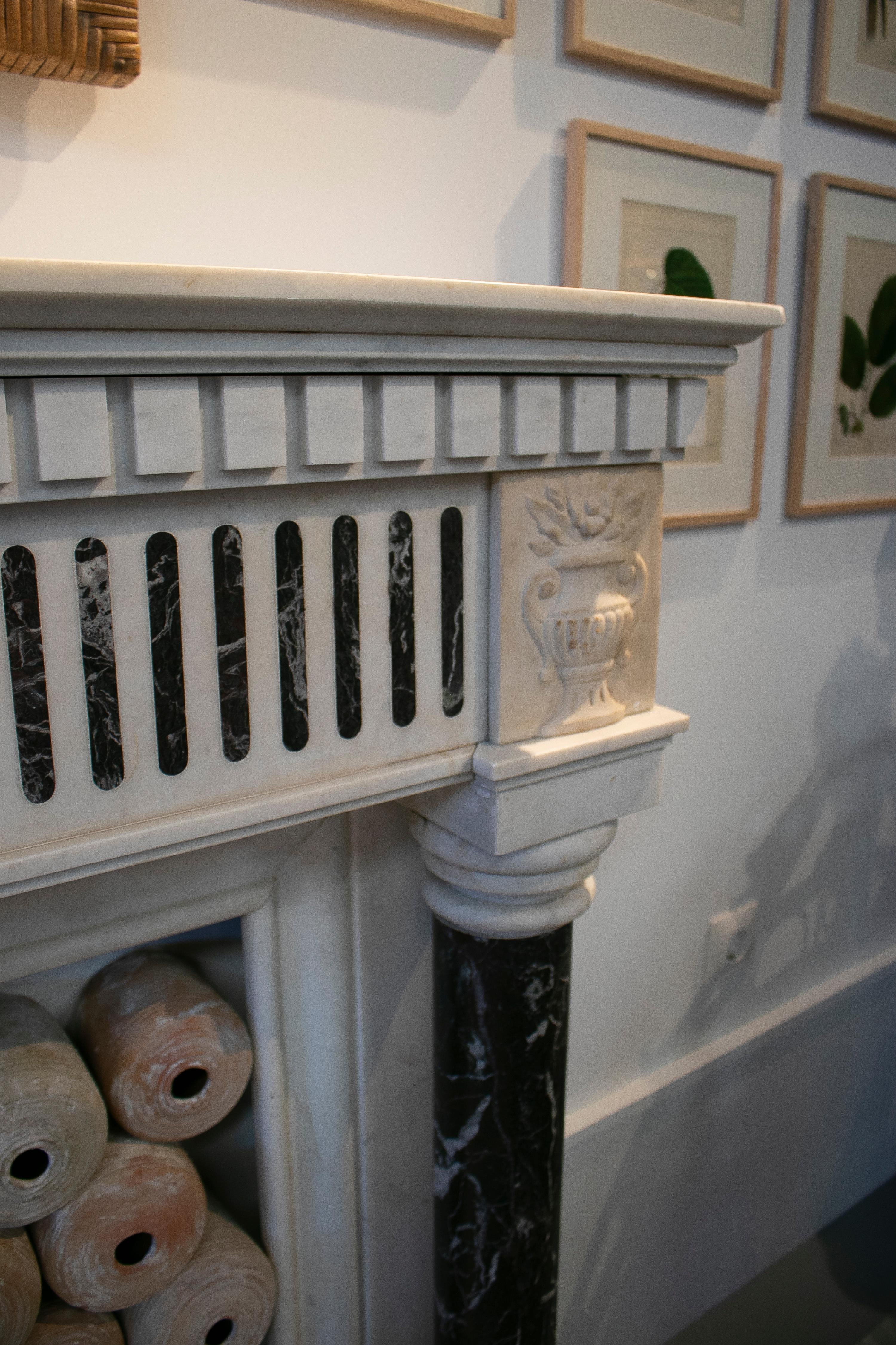 1950s English Hand Carved Marble Fireplace with Ionic Columns In Good Condition For Sale In Marbella, ES