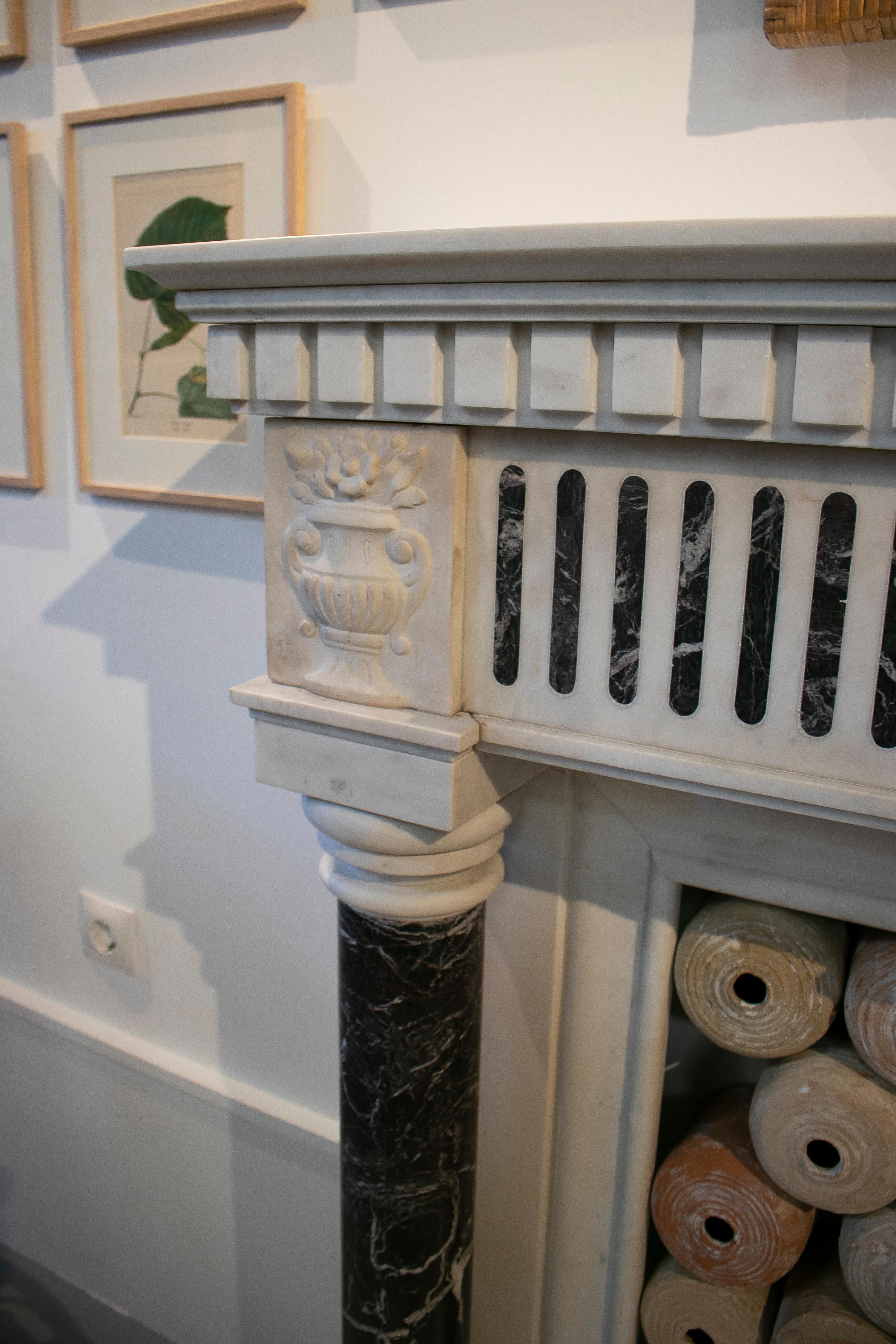 20th Century 1950s English Hand Carved Marble Fireplace with Ionic Columns For Sale