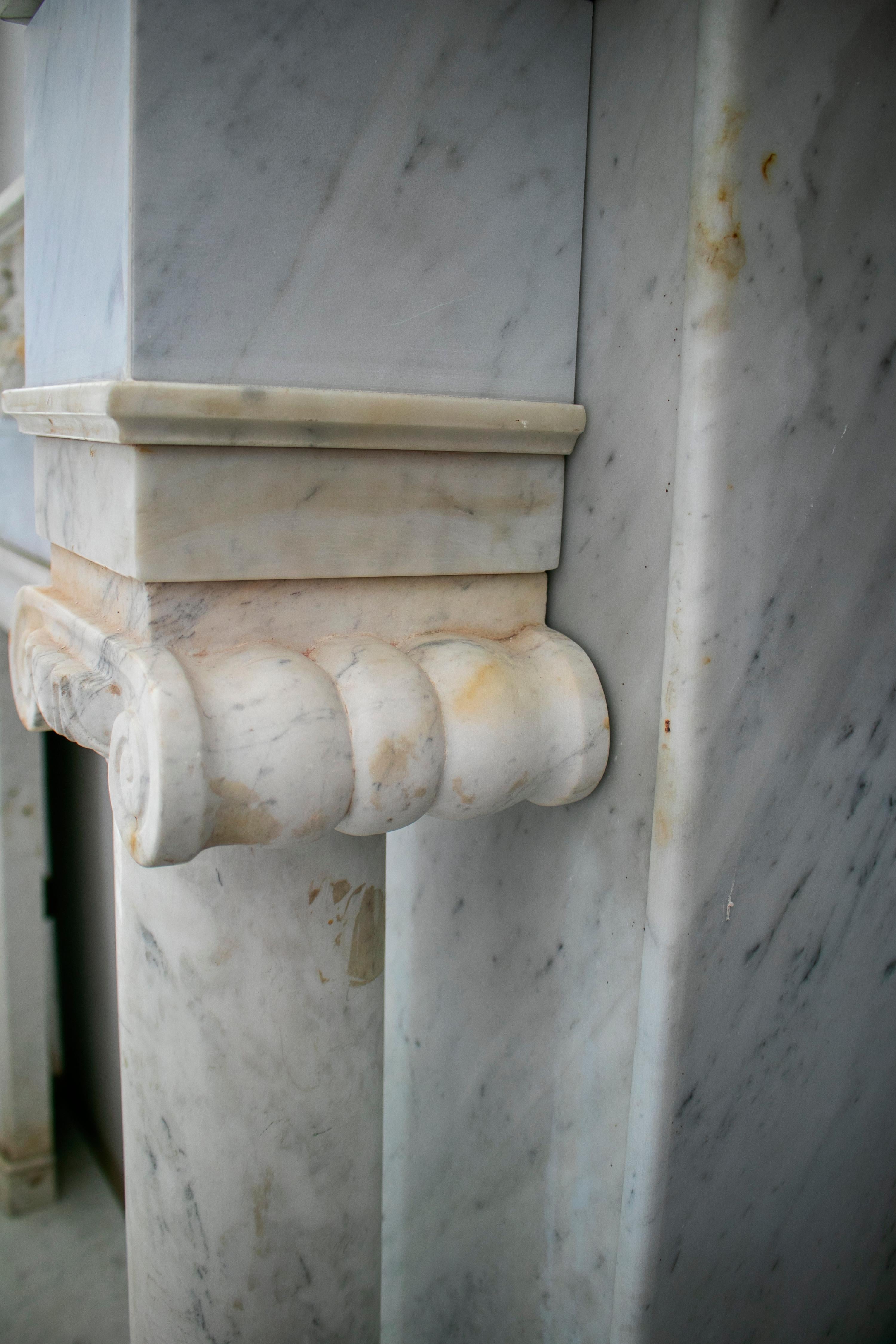 1950s English Hand Carved Marble Fireplace with Ionic Columns For Sale 1