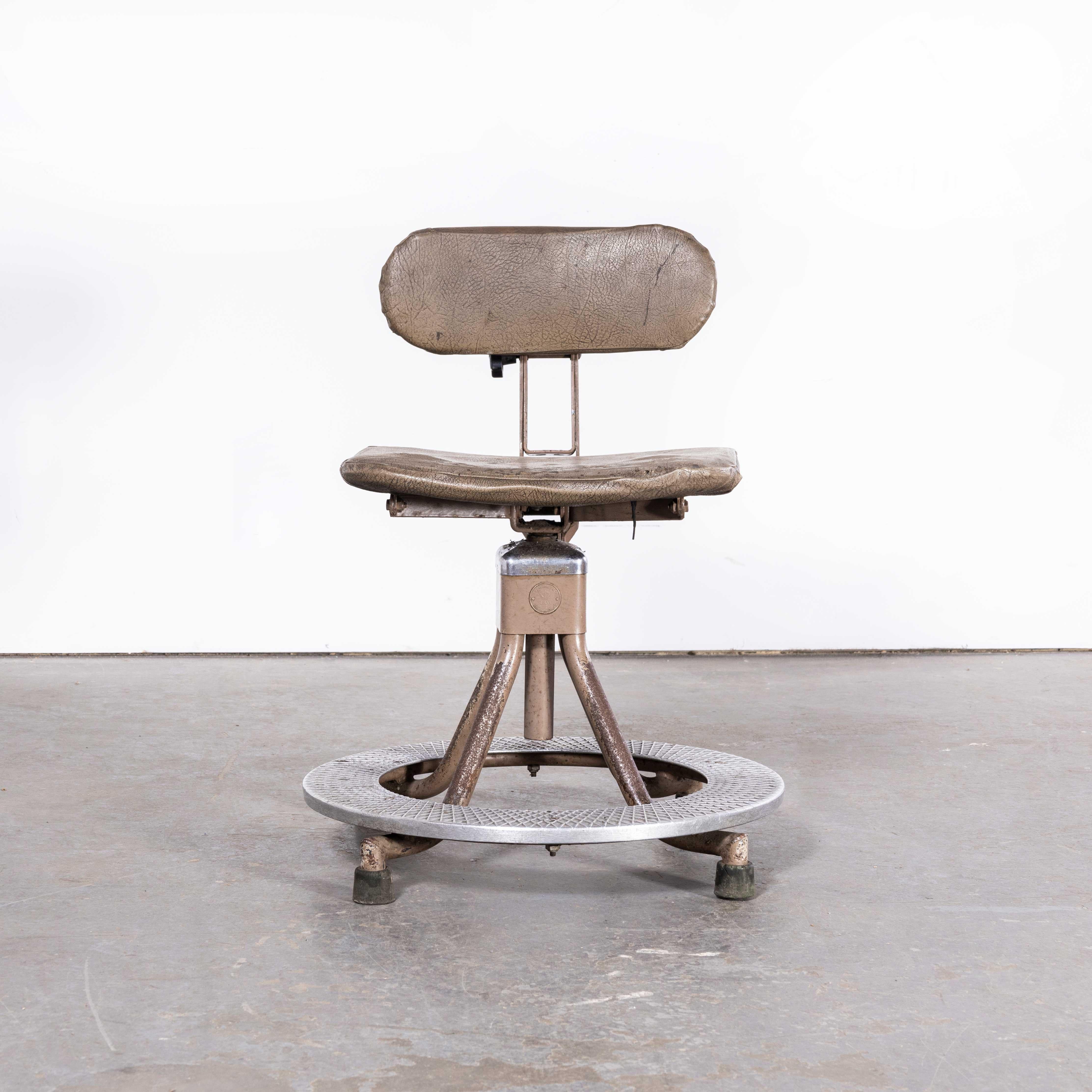 1950s Evertaut Original Machinists Chair – With Foot Support (2517)
1950s Evertaut Original Machinists Chair – With Foot Support. In it’s heyday Evertaut was the British competitor to Tolix, Multipl’s and Fibrocit. This chair is one of their iconic