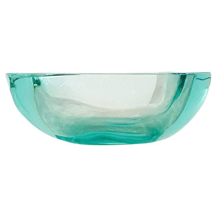 A rare example of a large signed Seguso Murano hand blown glass bowl. This wonderful pale turquoise bowl is in excellent condition, it is signed Seguso Murano on the base. It is in very good condition.