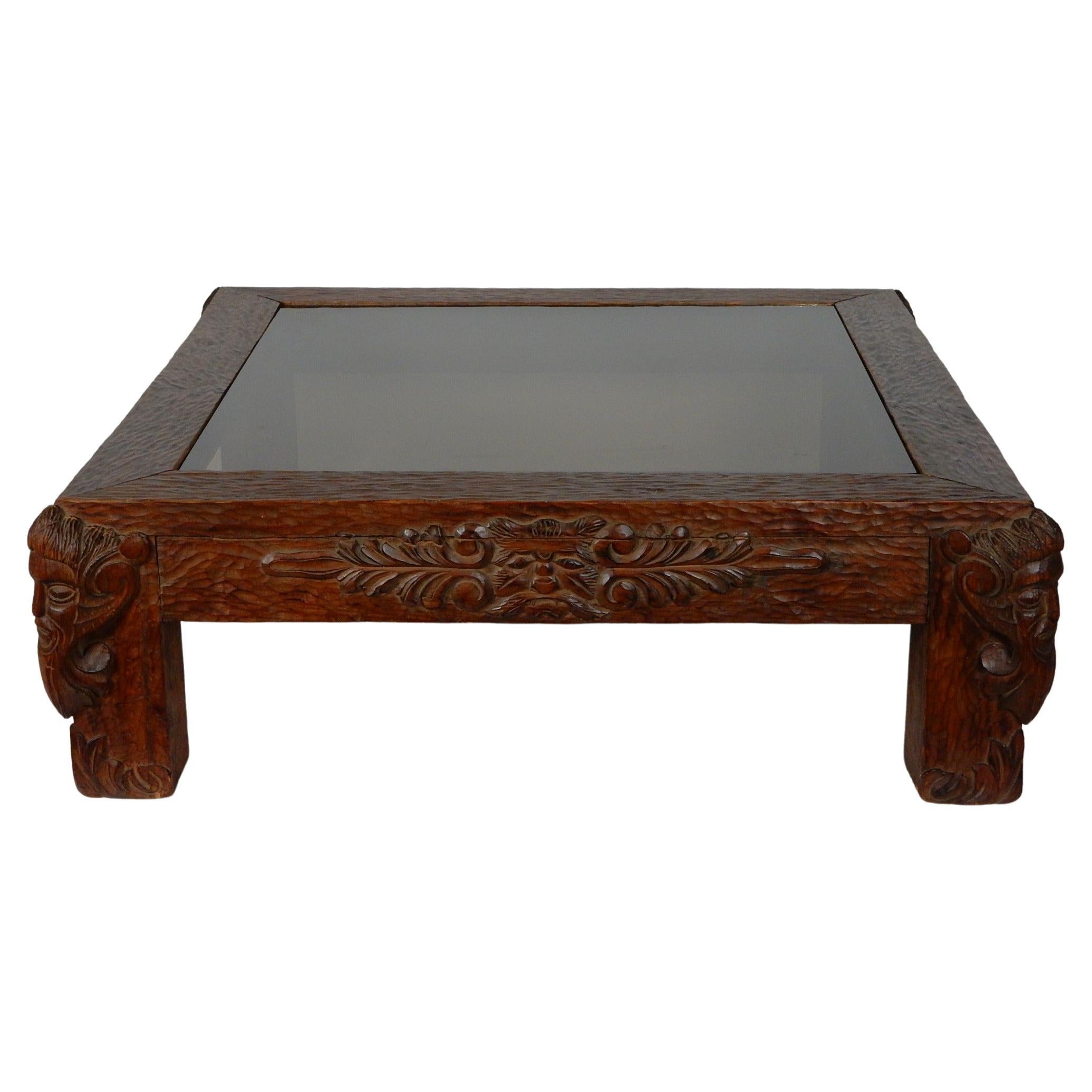hand carved coffee table with glass top