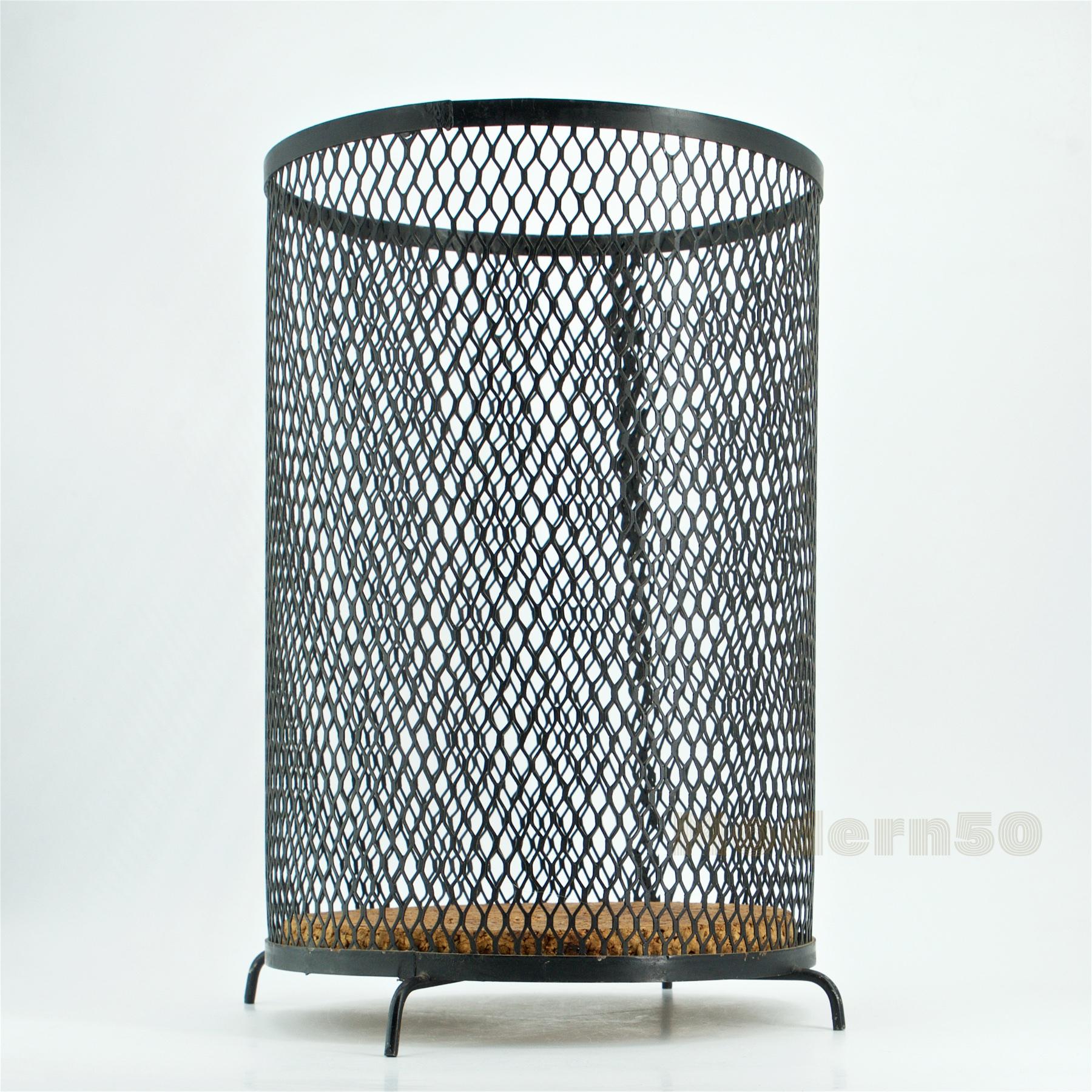 Wonderful little Atomic Age expanded metal trash can with a new sewn in cork bottom. Unknown designer. Basket only diameter is 8.5 in.