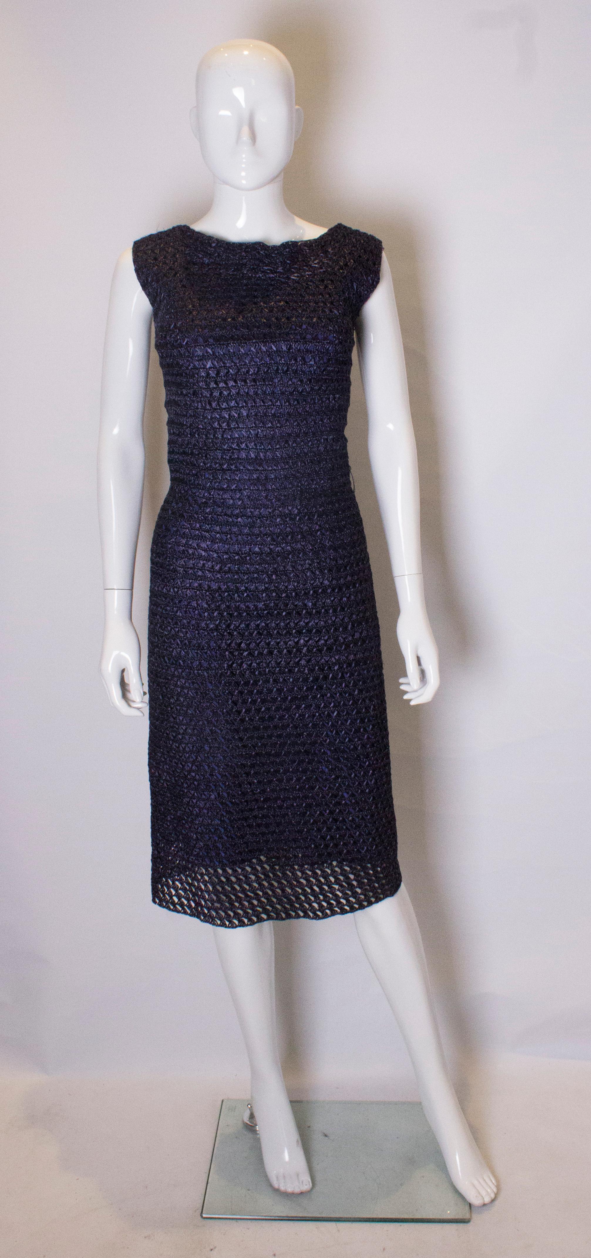 1950's Extreme Hourglass Woven Navy Blue Raffia Calf Length Cocktail Wiggle Dress  Size Small/Medium

This drop dead gorgeous dress is so flawlessly designed and beautifully executed. The dress is entirely lined and fashioned from beautiful supple
