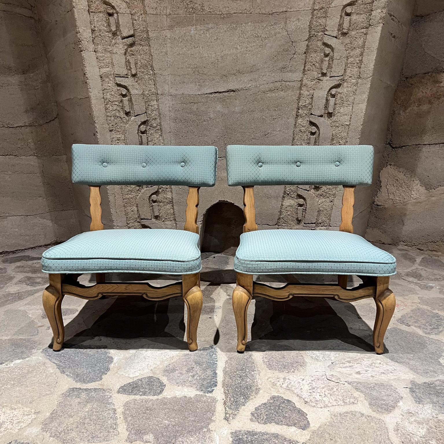 1950s Fabulous Blue French Slipper Chairs by Thomasville
Sculptural Wood Base
Label present 
28 h x 25.5 w 23.5 d Seat 14.5 h
Preowned vintage condition fresh new upholstery.
Refer to images listed 
Delivery to LA SF PS OC