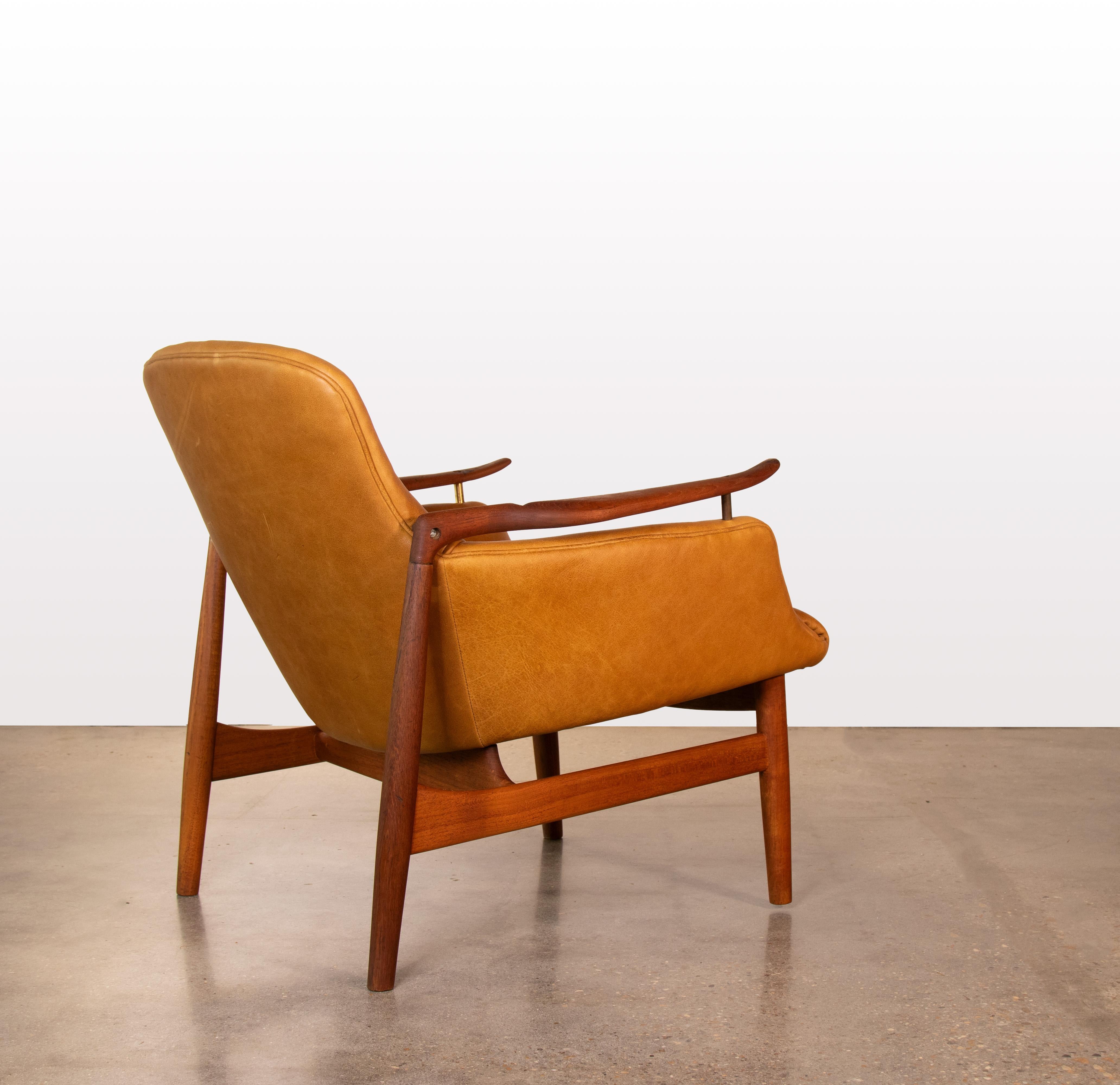 Scandinavian Modern 1950s Finn Juhl NV53 Armchair in Teak and Cognac Leather Illums Bolighus