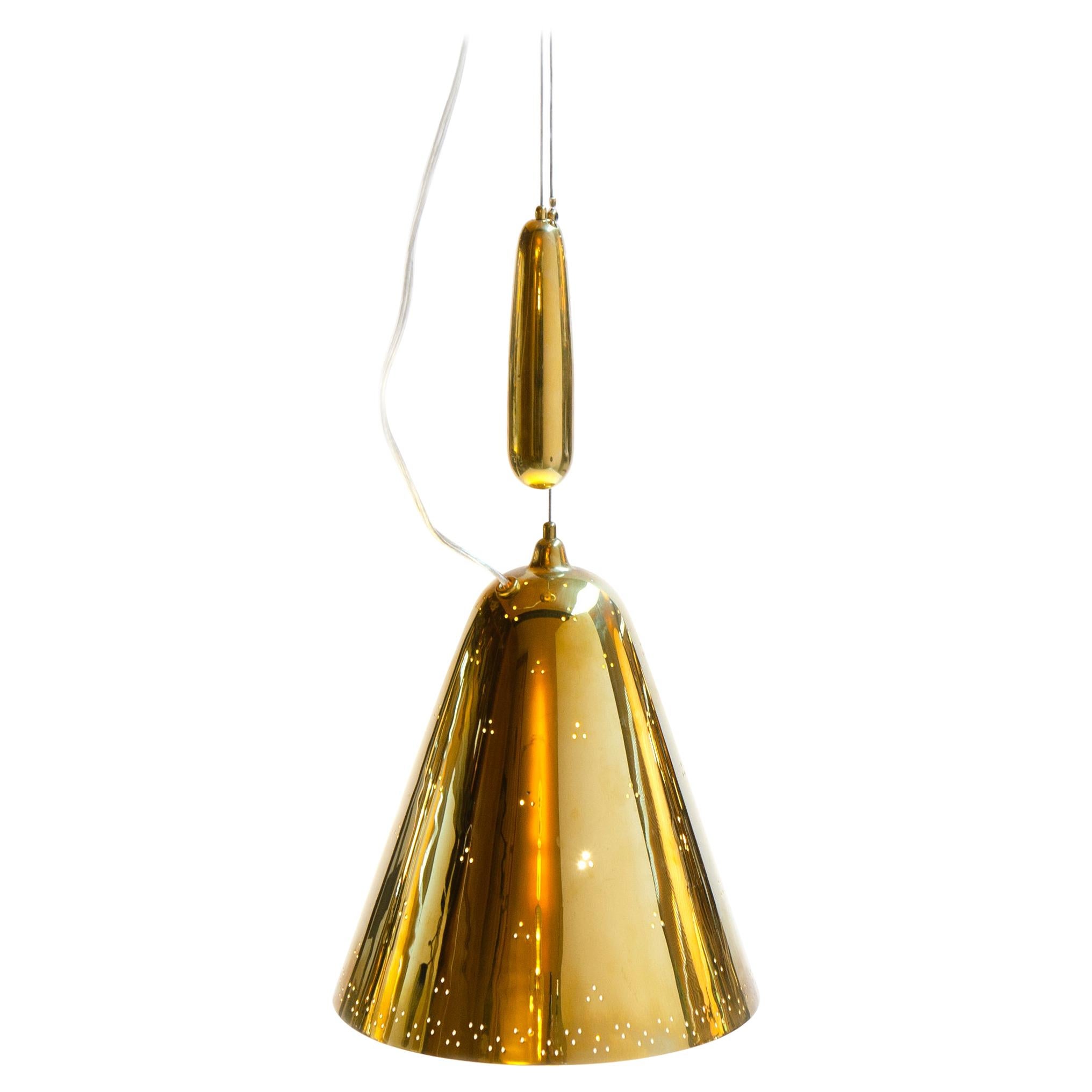 1950s Finnish Counterweighted Brass Pendant Light by Paavo Tynell for Taito Oy