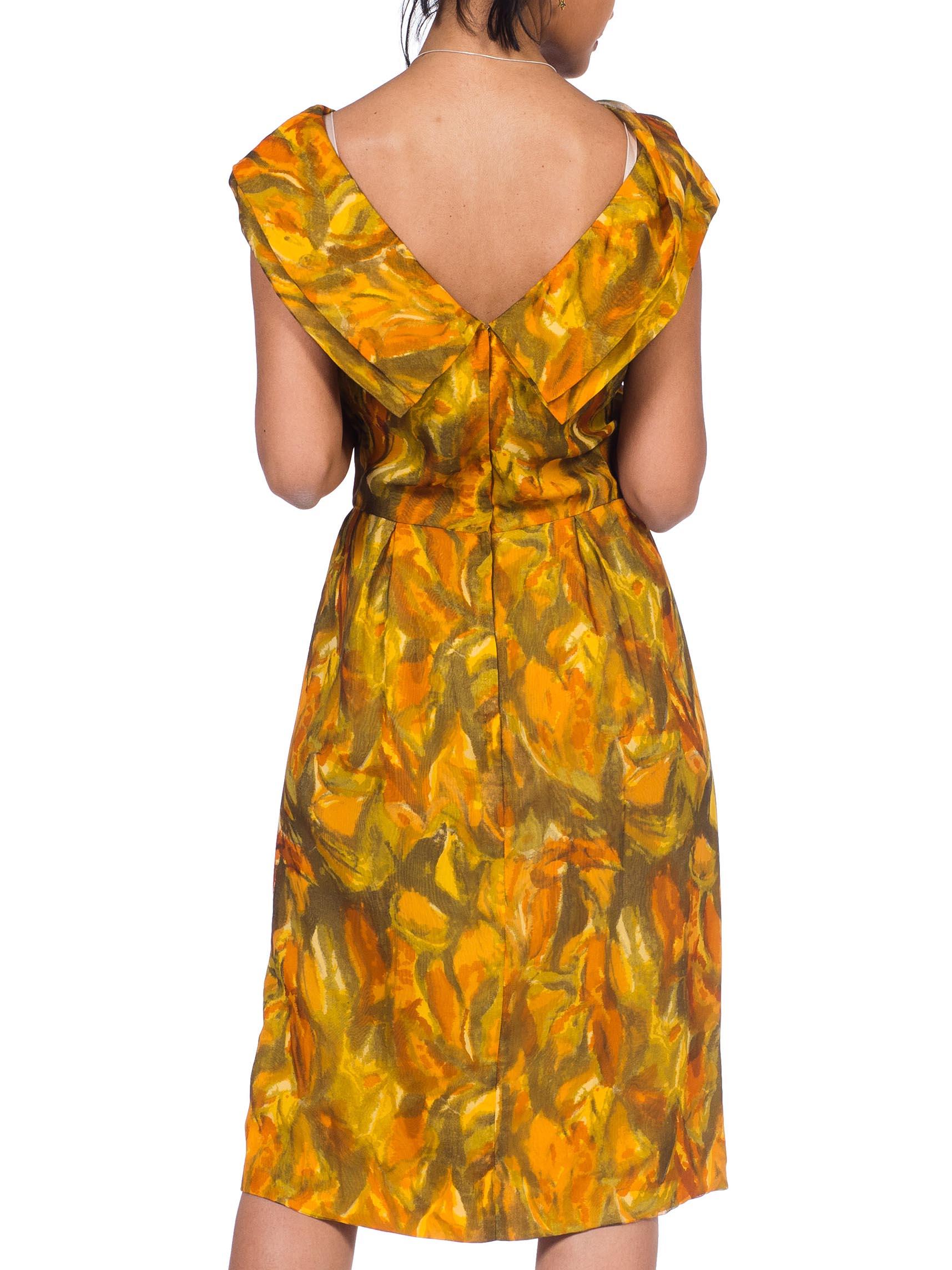 Demi Couture hand finishing throughout. fully lined in silk.  1950S Mustard Yellow & Olive Green Silk Chiffon Abstract Expressionist Floral Boat Neck Dress With Low Back 