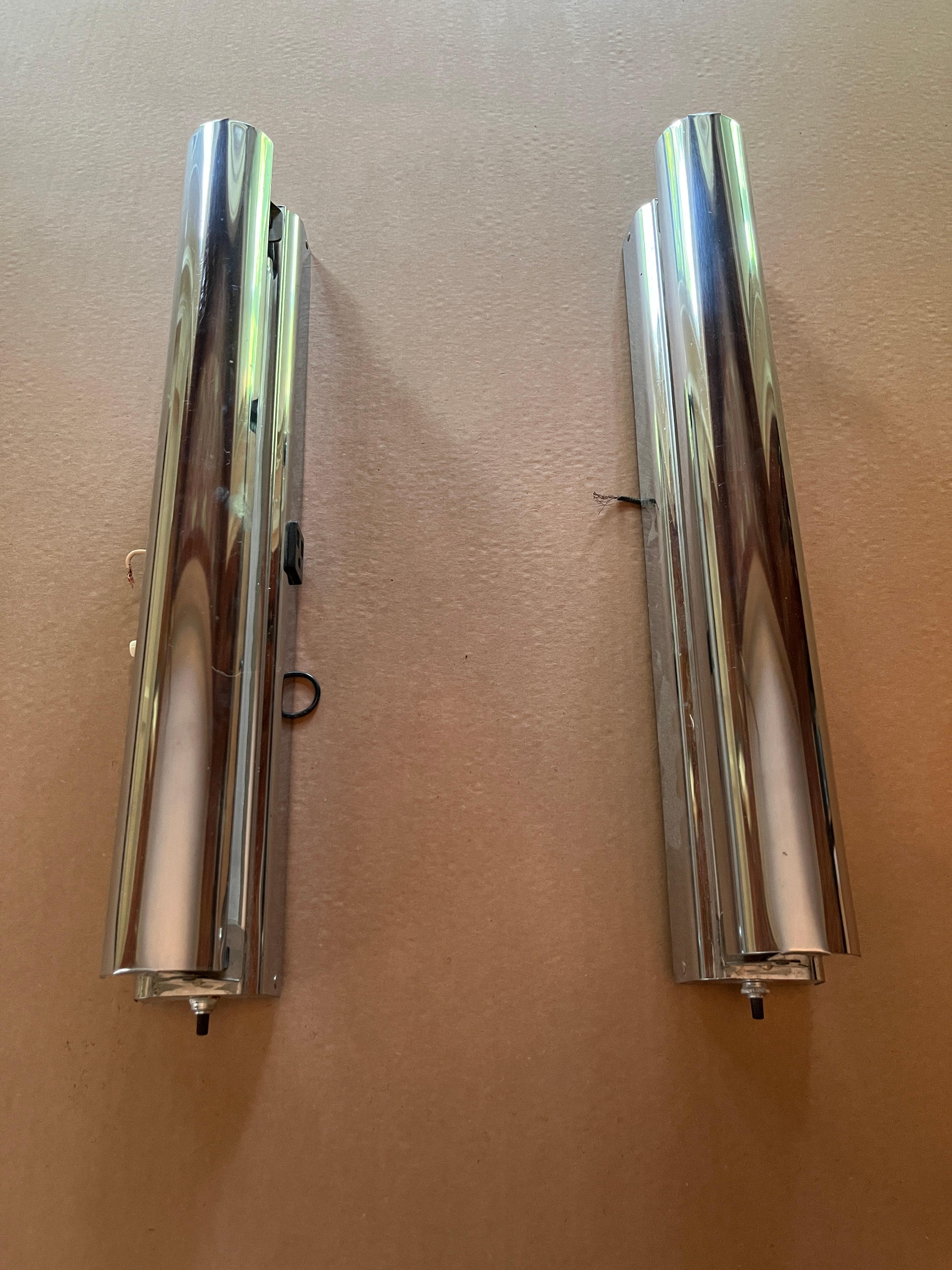 Mid-Century Modern bathroom florescent bathroom fixture with unusual chrome shades. Both fully functional when tested with 18