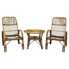 1950s Franco Albini Pair of “French Riviera” Rattan Armchairs and Coofee Table