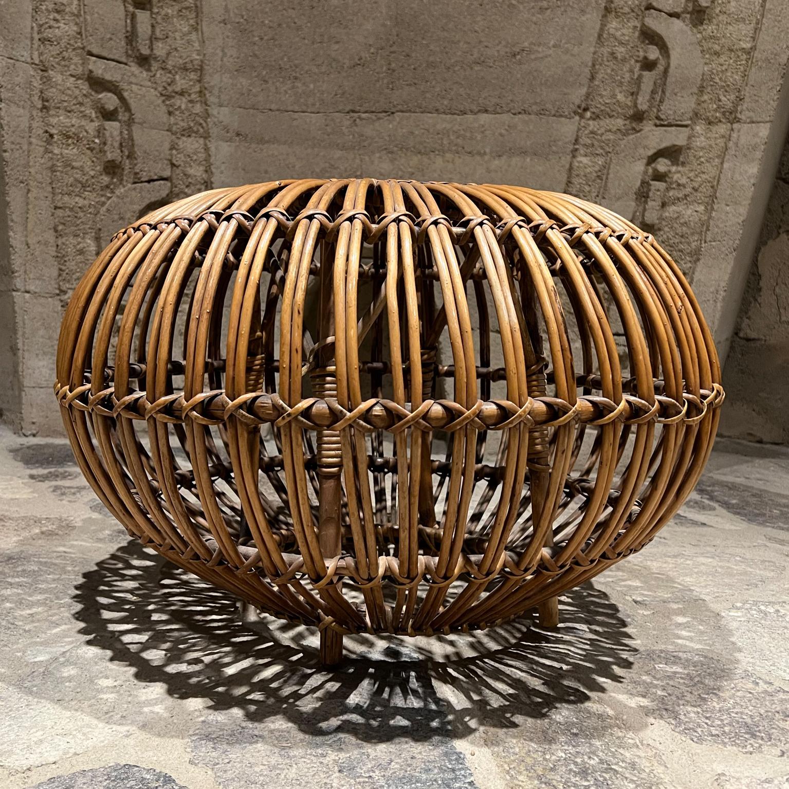 Ottoman stool
Franco Albini ottoman large Pouf in Rattan from Italy
Unmarked
Measures: 23.5 diameter x 15.75 height inches
Preowned original unrestored vintage condition. It has slight damage at top missing cane.
Firm and sturdy.
See images