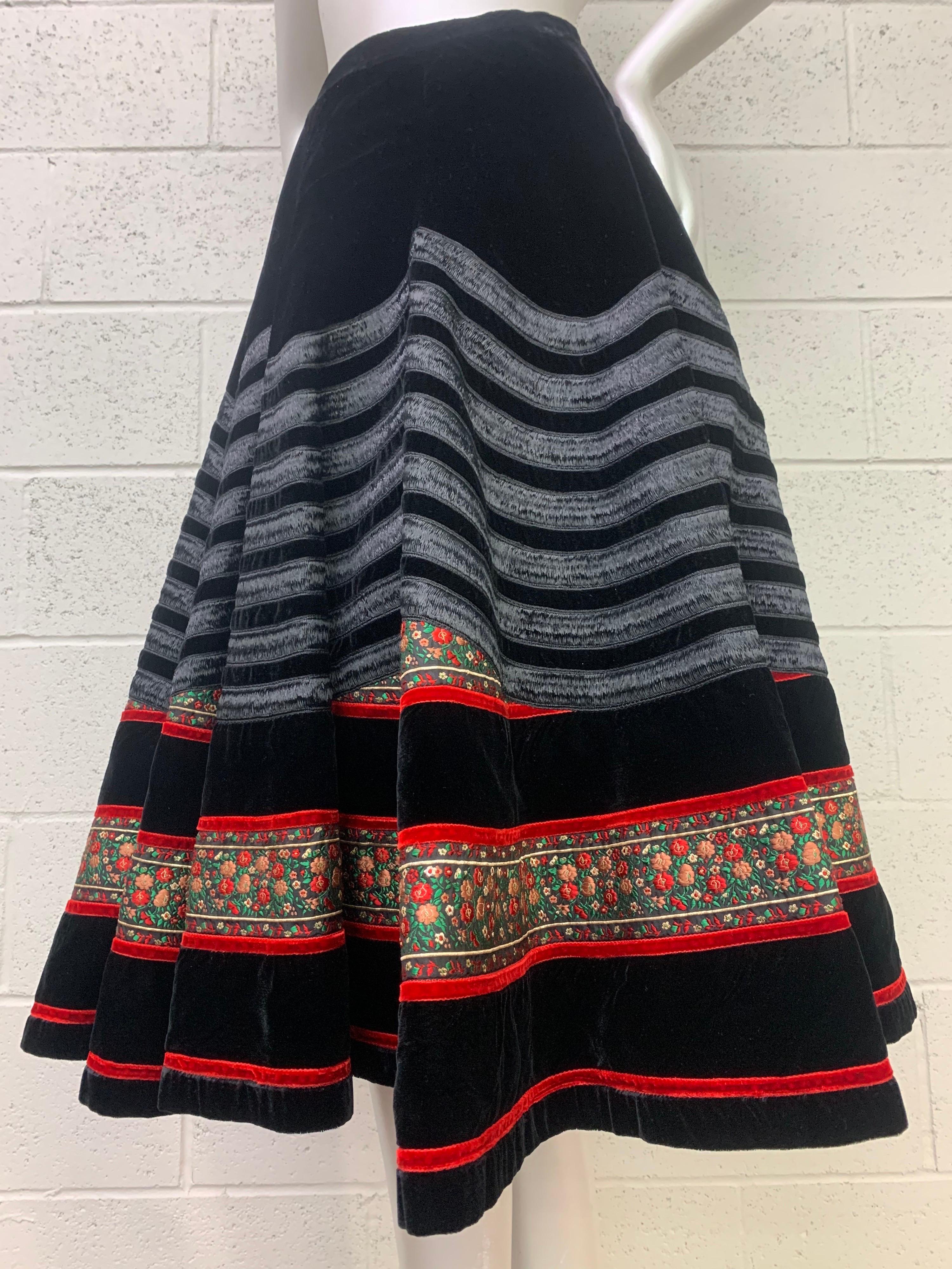 A beautiful 1950s Franco Bertoli - Milan full 360 degree circle skirt finished in an exquisite traditional style with rows of horsehair braid in a chevron design, floral brocade ribbon, black velvet and lined in red taffeta. Tab waistband can be