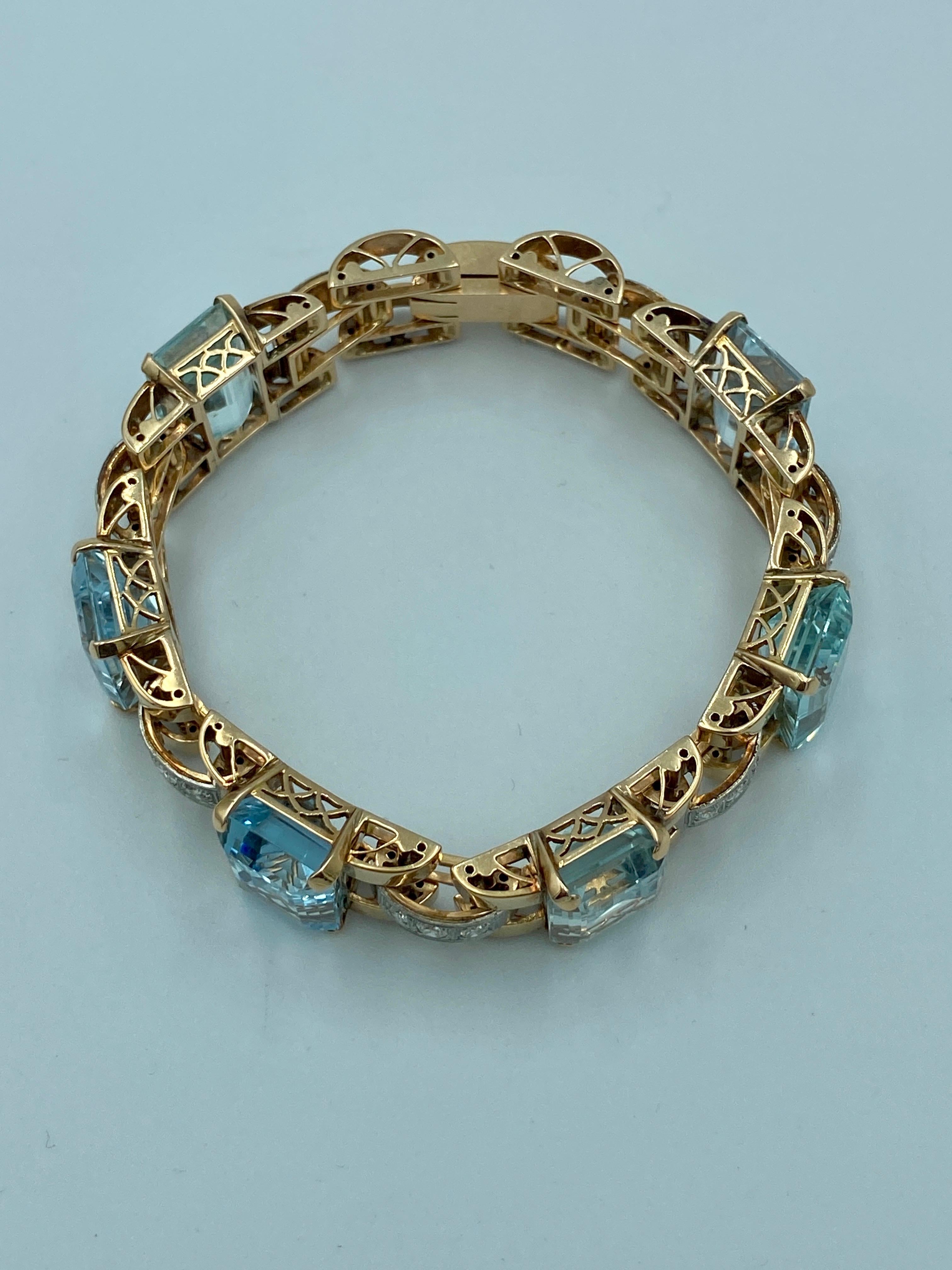 Emerald Cut 1950s French 18 carat gold aquamarine and diamond bracelet