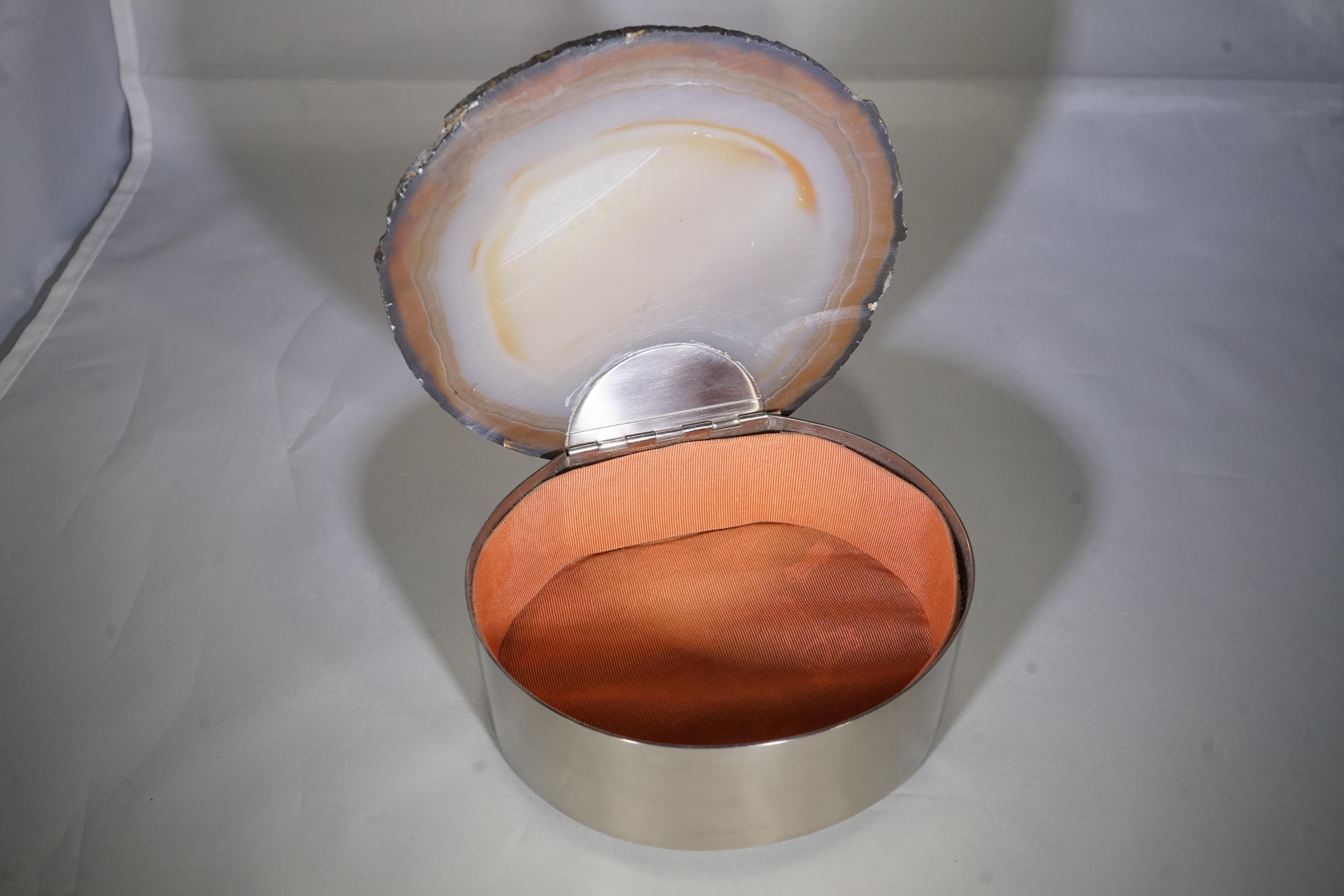 1950s French vide pouche box featuring an agate stone lid with a silver plated base. Lined in fabric.