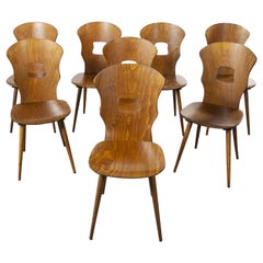 chaise de salle à manger française Baumann en bois de dentelle des années 1950:: ensemble de huit pièces