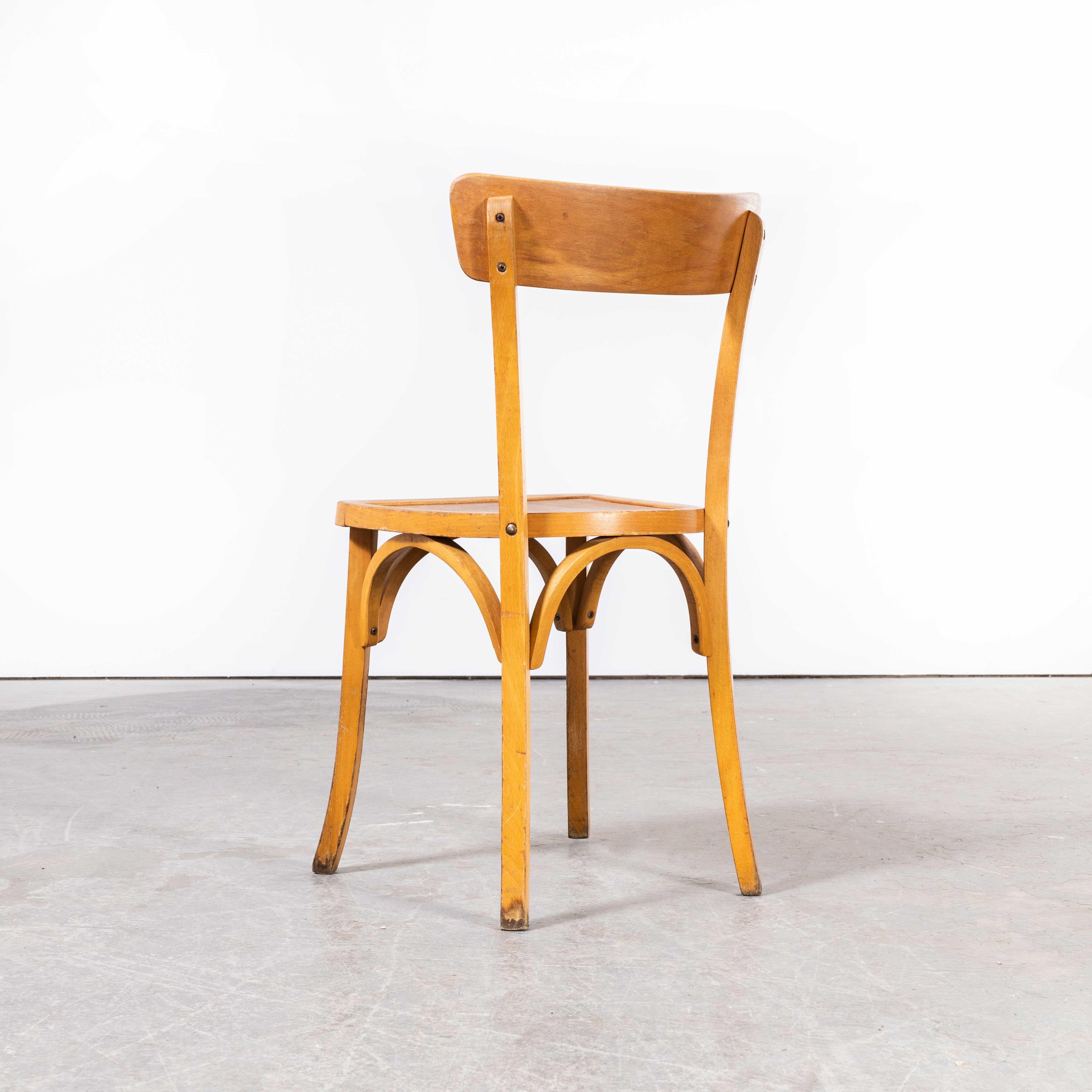 1950’s French Baumann Blonde Kick leg bentwood dining chairs – set of four
1950’s French Baumann Blonde Kick leg bentwood dining chairs – set of four. Baumann is a slightly off the radar French producer just starting to gain traction in the market.