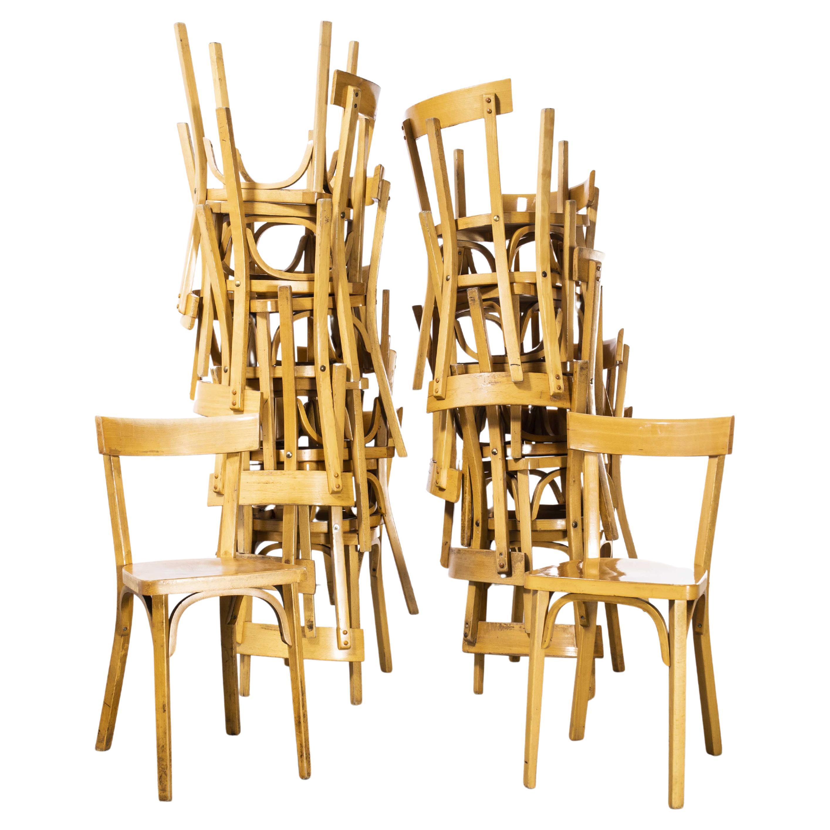 Ensemble de six chaises de salle à manger Baumann en bois cintré à dossier mince blond des années 1950, France
