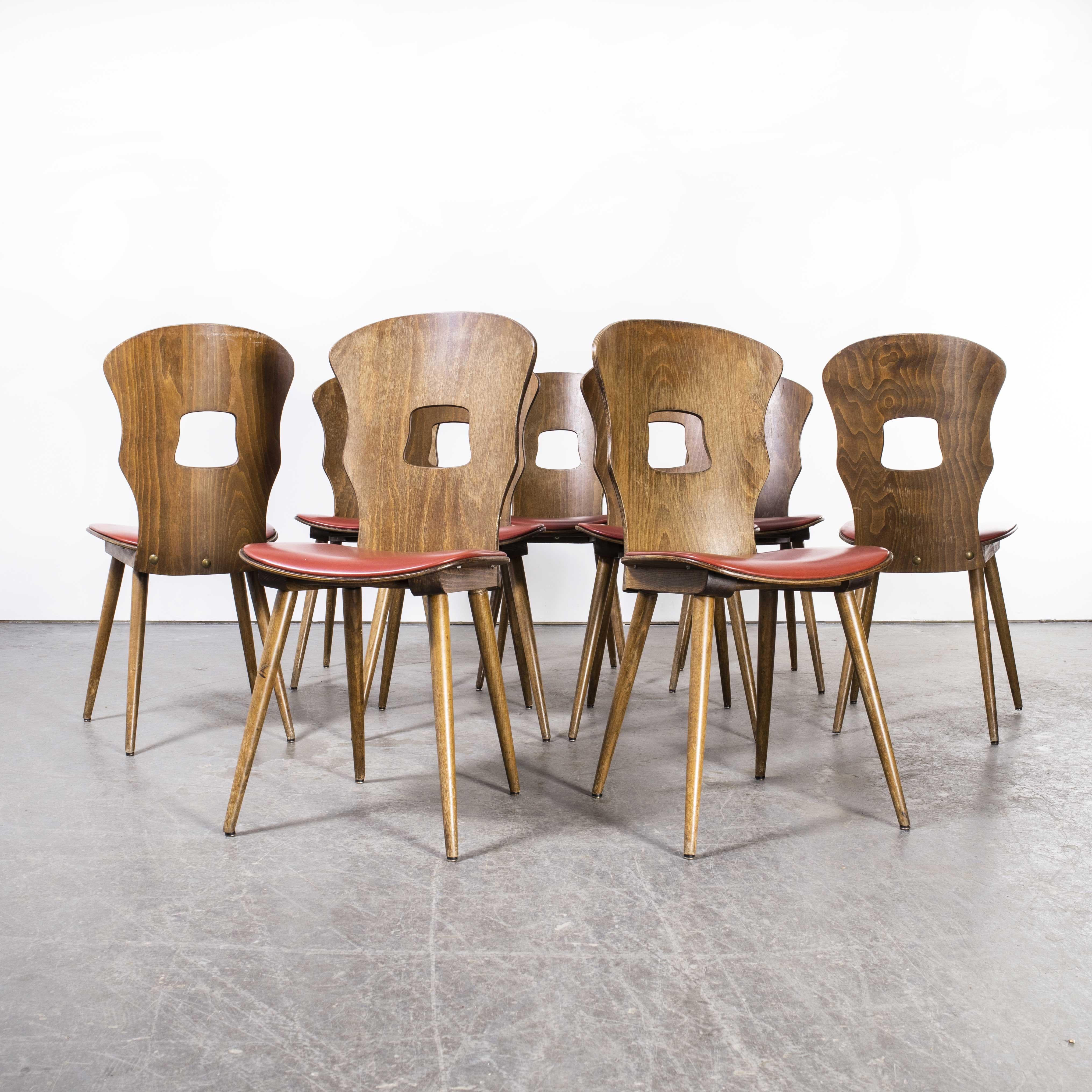 1950’s French baumann upholstered seat gentiane dining chair – set of nine.
1950’s French baumann upholstered seat gentiane dining chair – set of nine. Classic beech bistro chair made in France by the maker Baumann. Baumann is a slightly off the