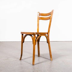 Dos ondulé Baumann français des années 1950  Chaises de salle à manger en bois courbé - Ensemble de quatre
