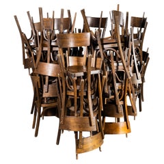 Chaise de salle à manger française des années 1950 en bois cintré foncé, grande quantité disponible