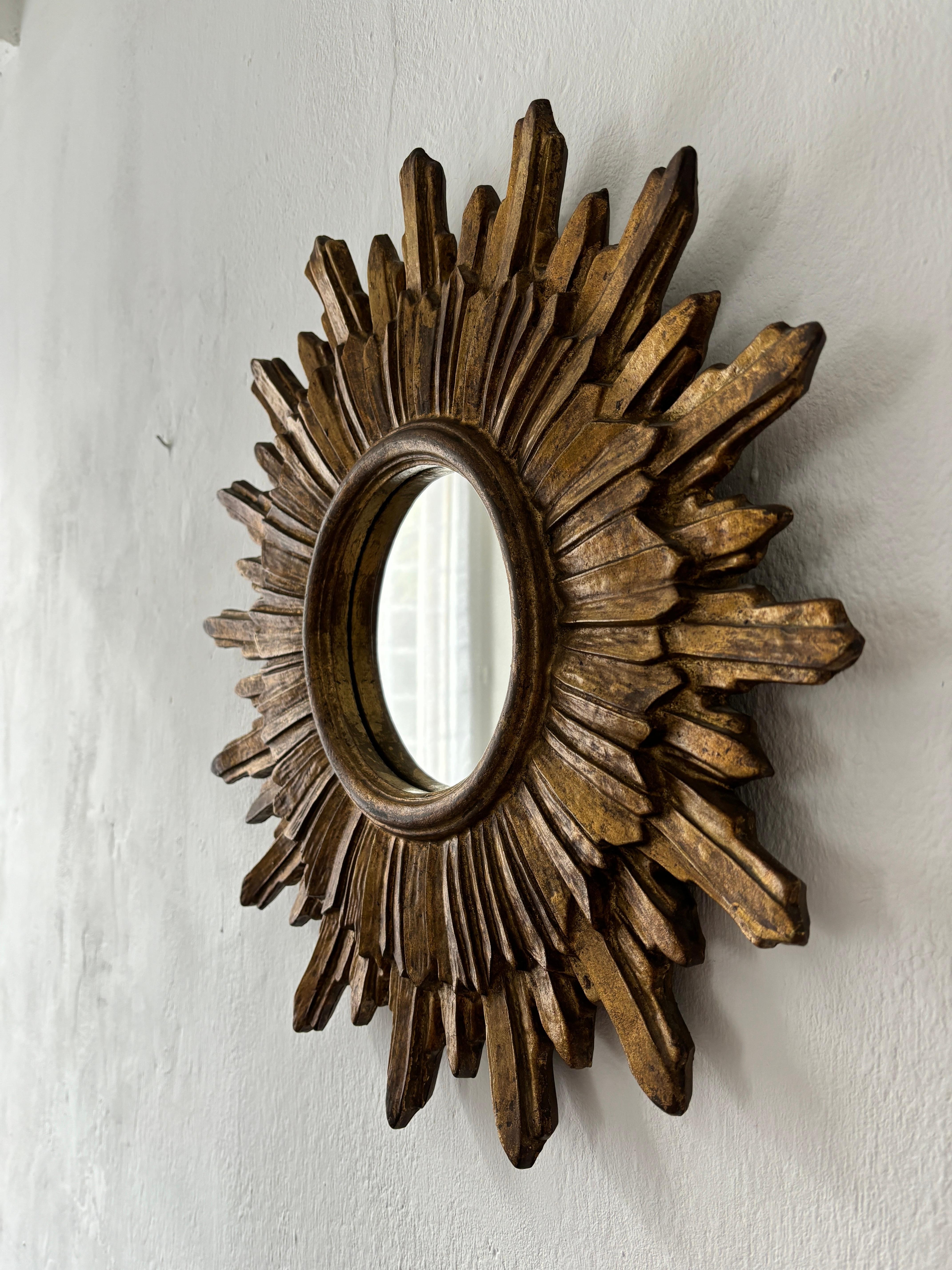 Beautiful big French double wood gold starburst. Amazing patina. Gold wood with mirror in perfect shape. Mirror itself measures 6.5 inches round. Original felt backing, small hole as shown.  Free priority UPS shipping from Italy, no custom fees.