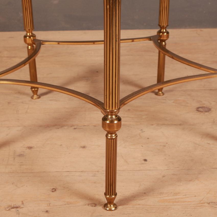 1950s French brass and glass circular lamp table, 1950.



Dimensions:
16 inches (41 cms) high
24 inches (61 cms) diameter.