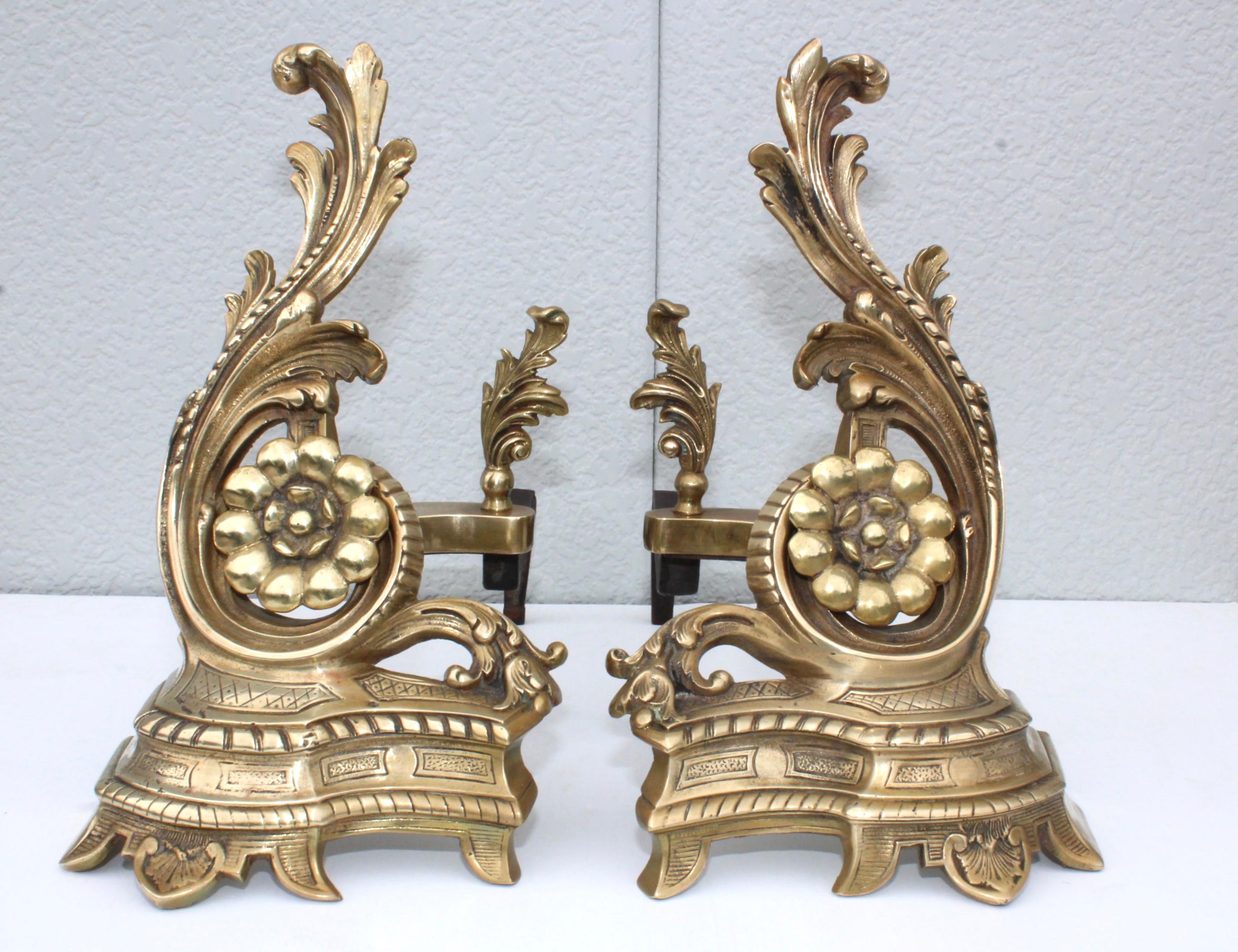 Stunning pair of 1950s solid brass French andirons.