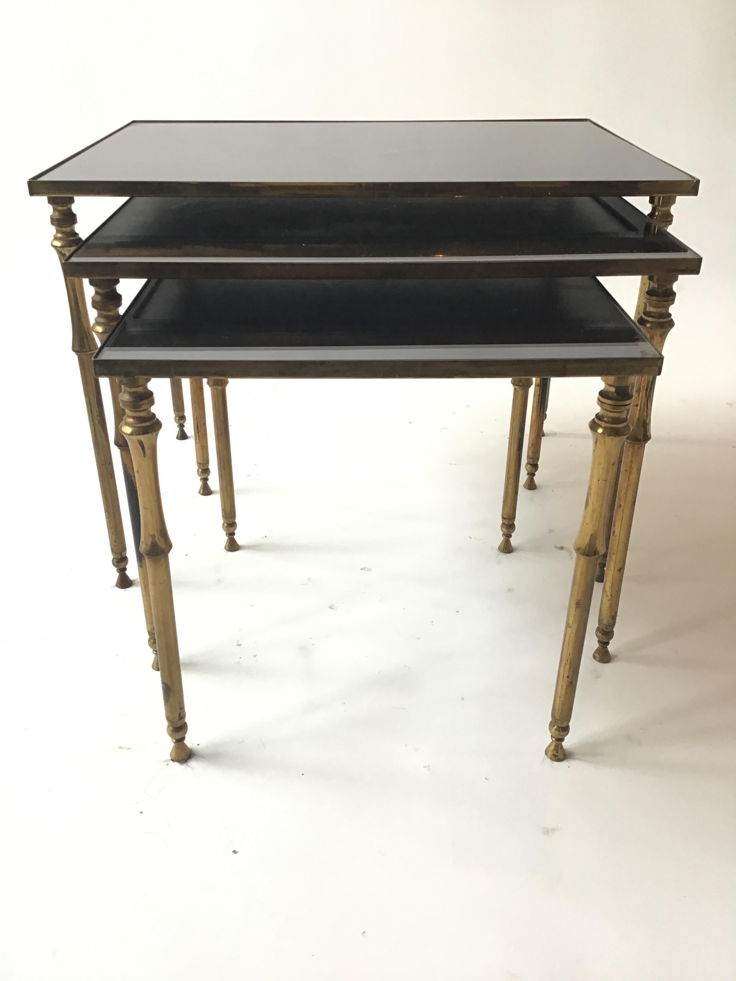 1950s French Faux Bamboo Brass And Black Glass Nesting Tables In Good Condition For Sale In Tarrytown, NY